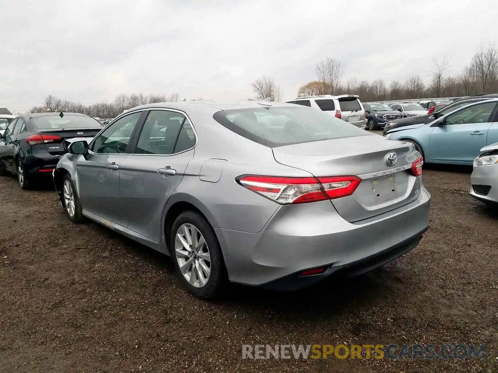 3 Photograph of a damaged car 4T1B11HK1KU789056 TOYOTA CAMRY 2019