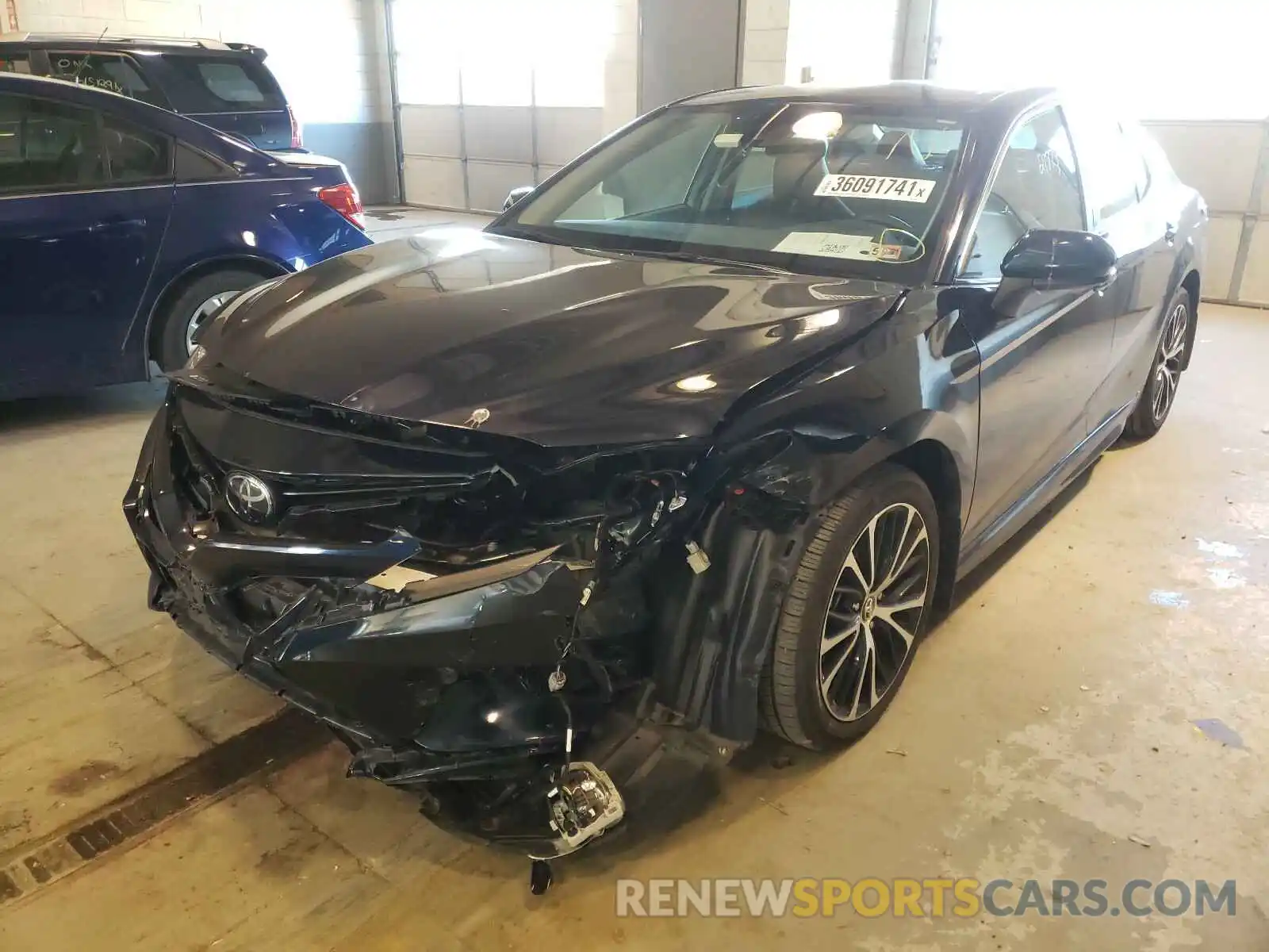 2 Photograph of a damaged car 4T1B11HK1KU792569 TOYOTA CAMRY 2019