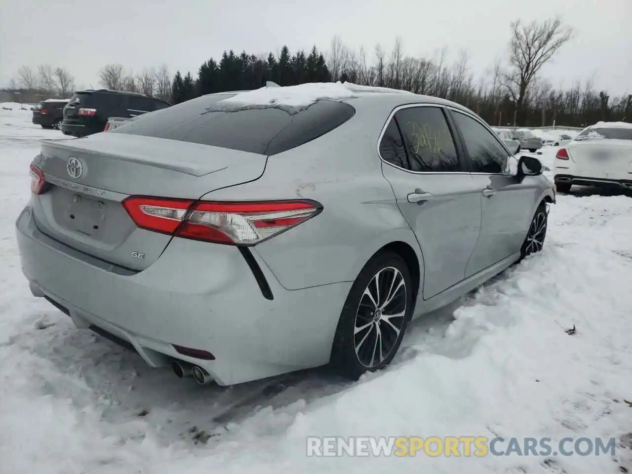 4 Photograph of a damaged car 4T1B11HK1KU793611 TOYOTA CAMRY 2019