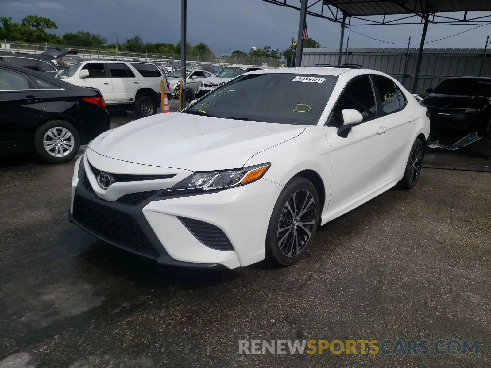 2 Photograph of a damaged car 4T1B11HK1KU794600 TOYOTA CAMRY 2019