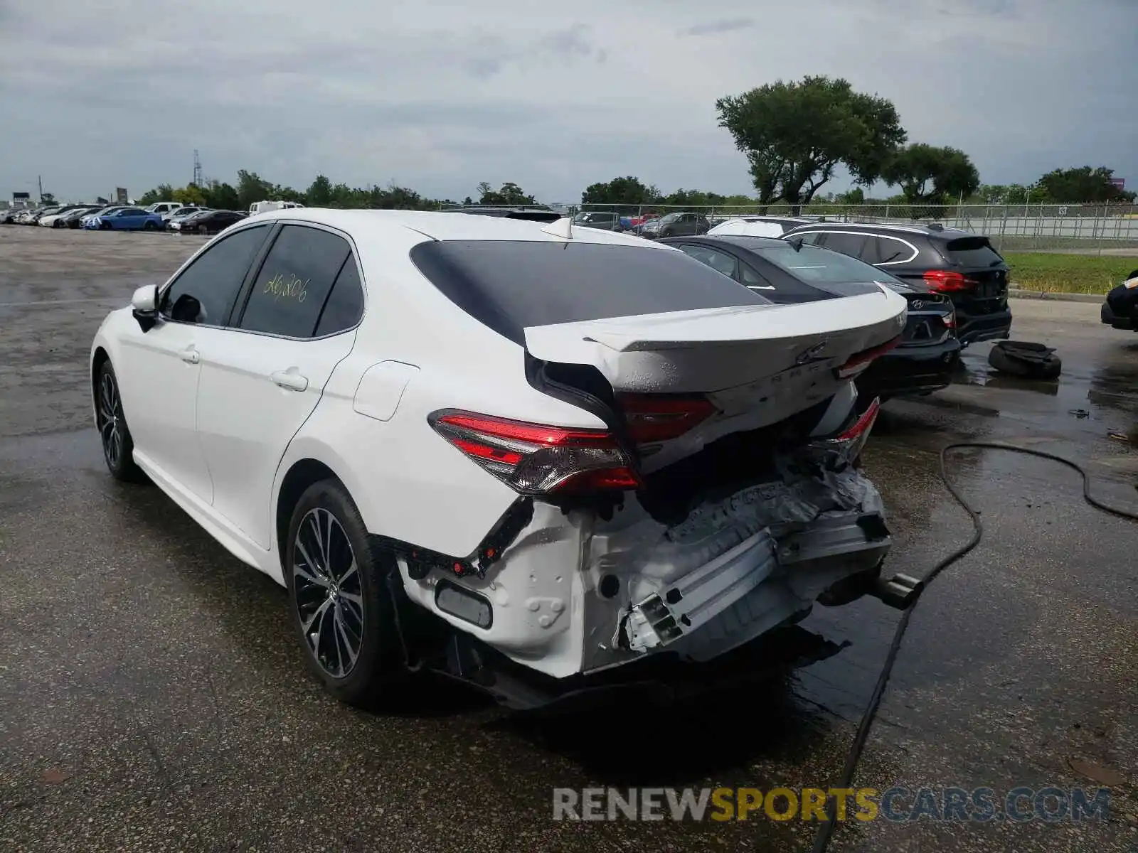 3 Photograph of a damaged car 4T1B11HK1KU794600 TOYOTA CAMRY 2019