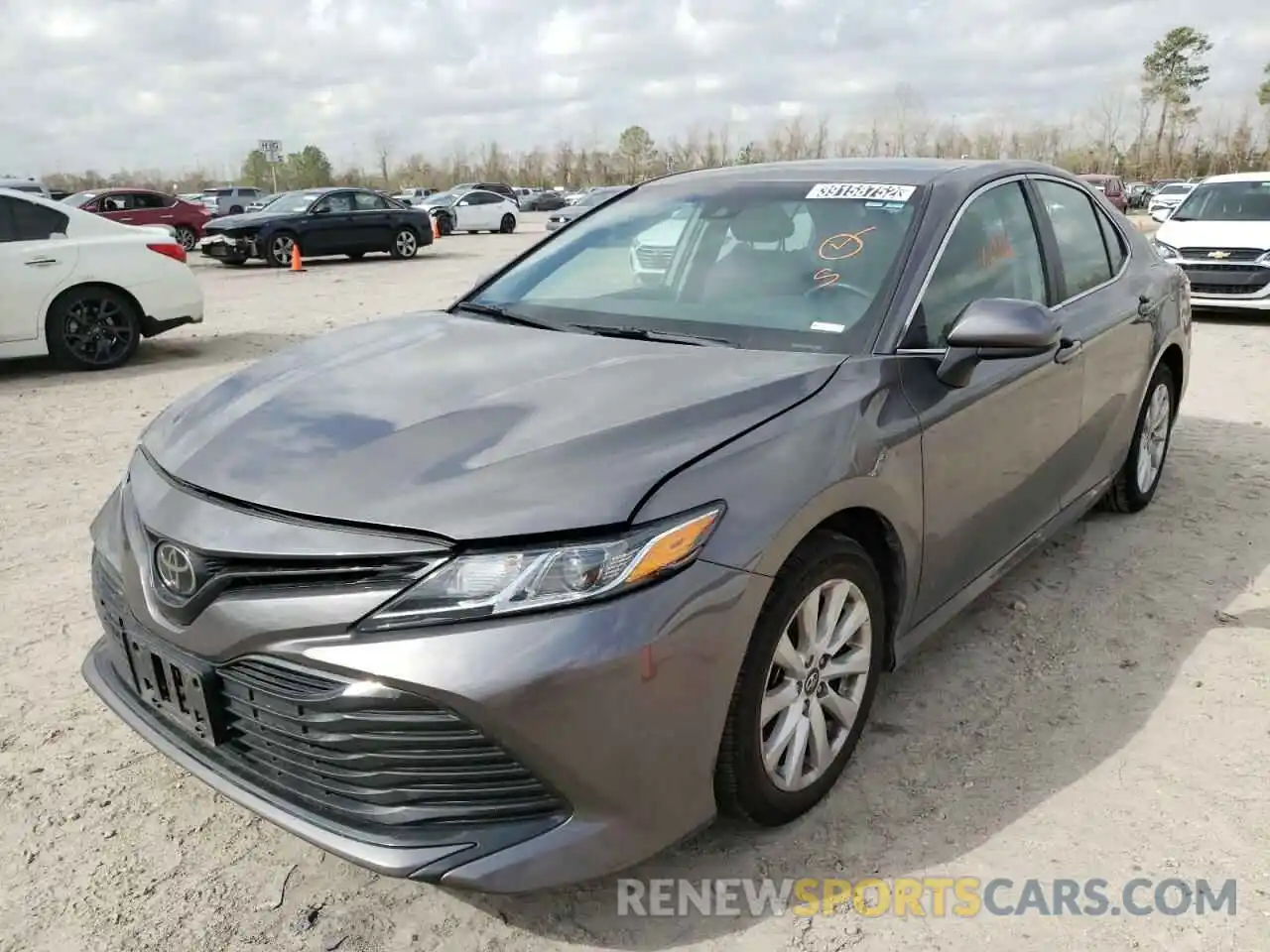 2 Photograph of a damaged car 4T1B11HK1KU794709 TOYOTA CAMRY 2019