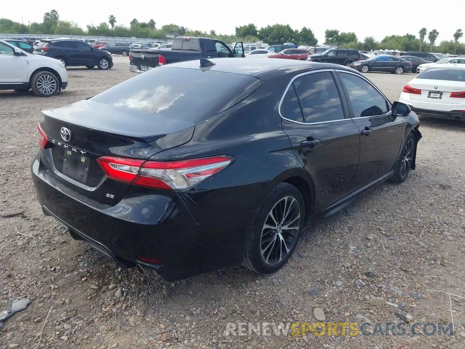 4 Photograph of a damaged car 4T1B11HK1KU795939 TOYOTA CAMRY 2019