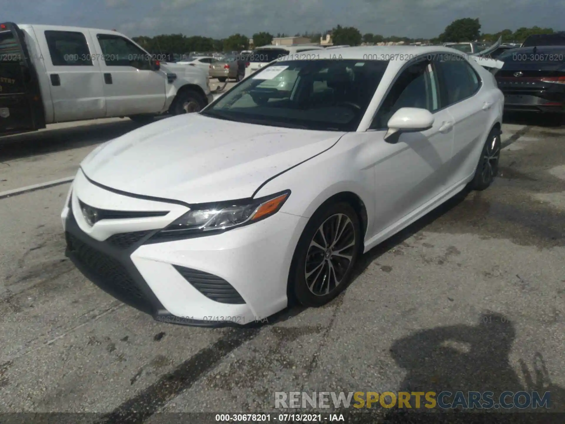 2 Photograph of a damaged car 4T1B11HK1KU796928 TOYOTA CAMRY 2019