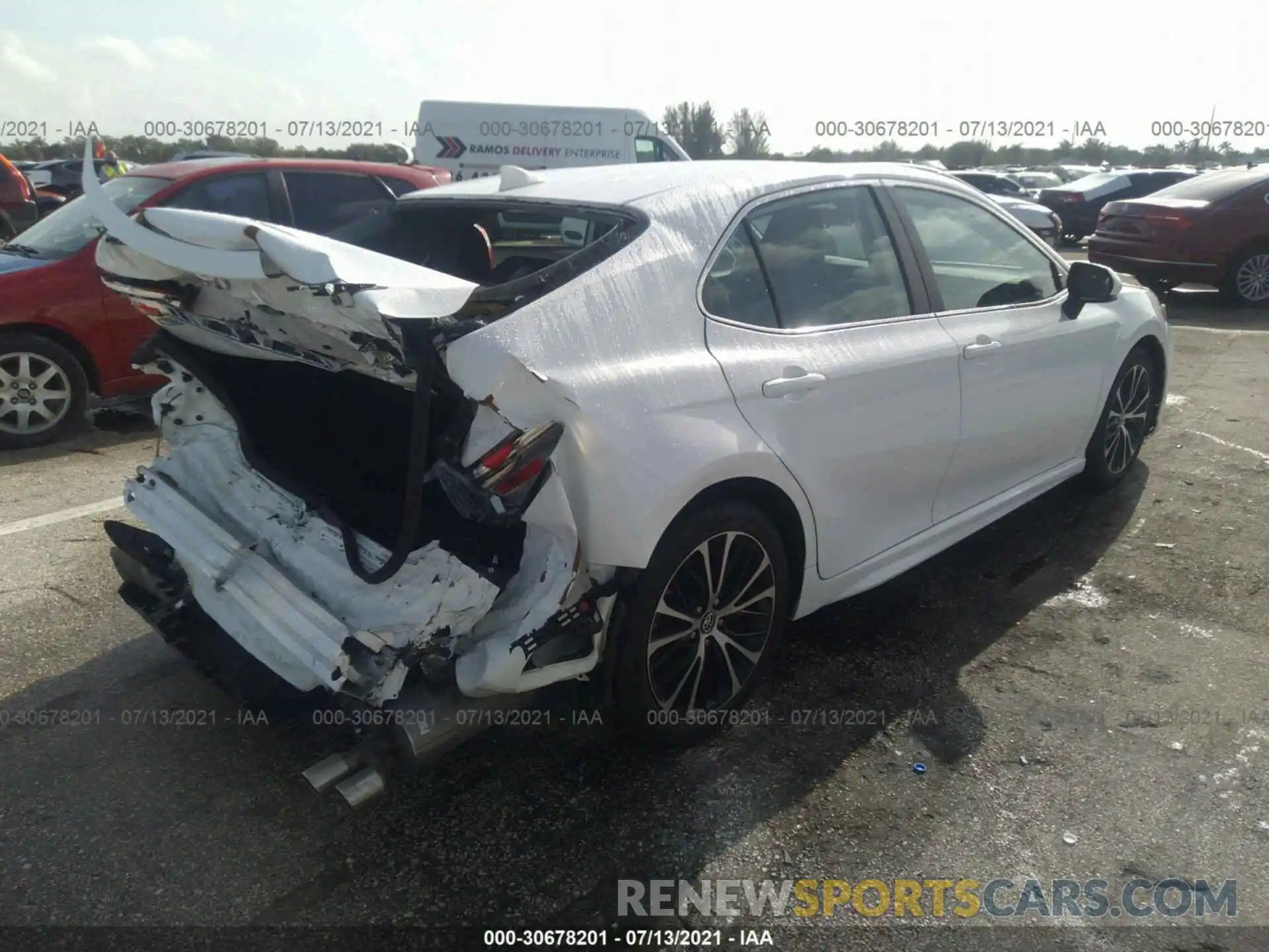 4 Photograph of a damaged car 4T1B11HK1KU796928 TOYOTA CAMRY 2019