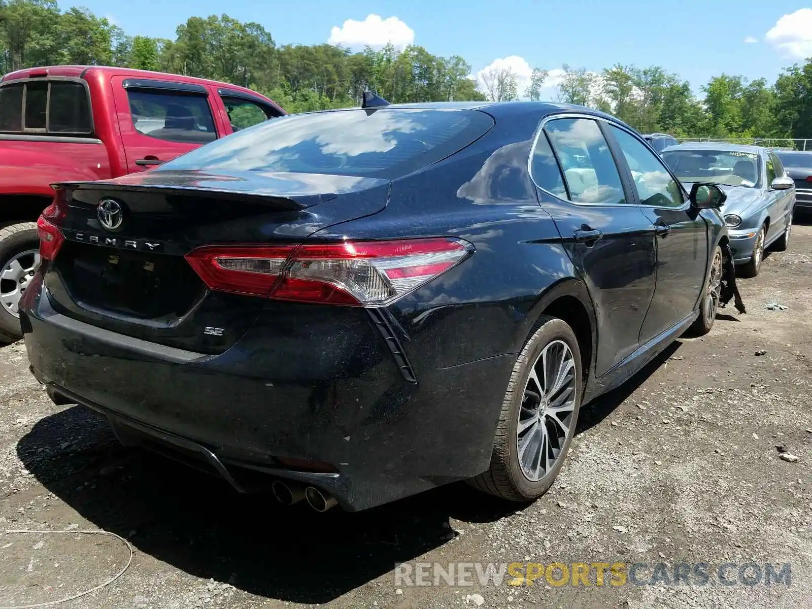 4 Photograph of a damaged car 4T1B11HK1KU797271 TOYOTA CAMRY 2019