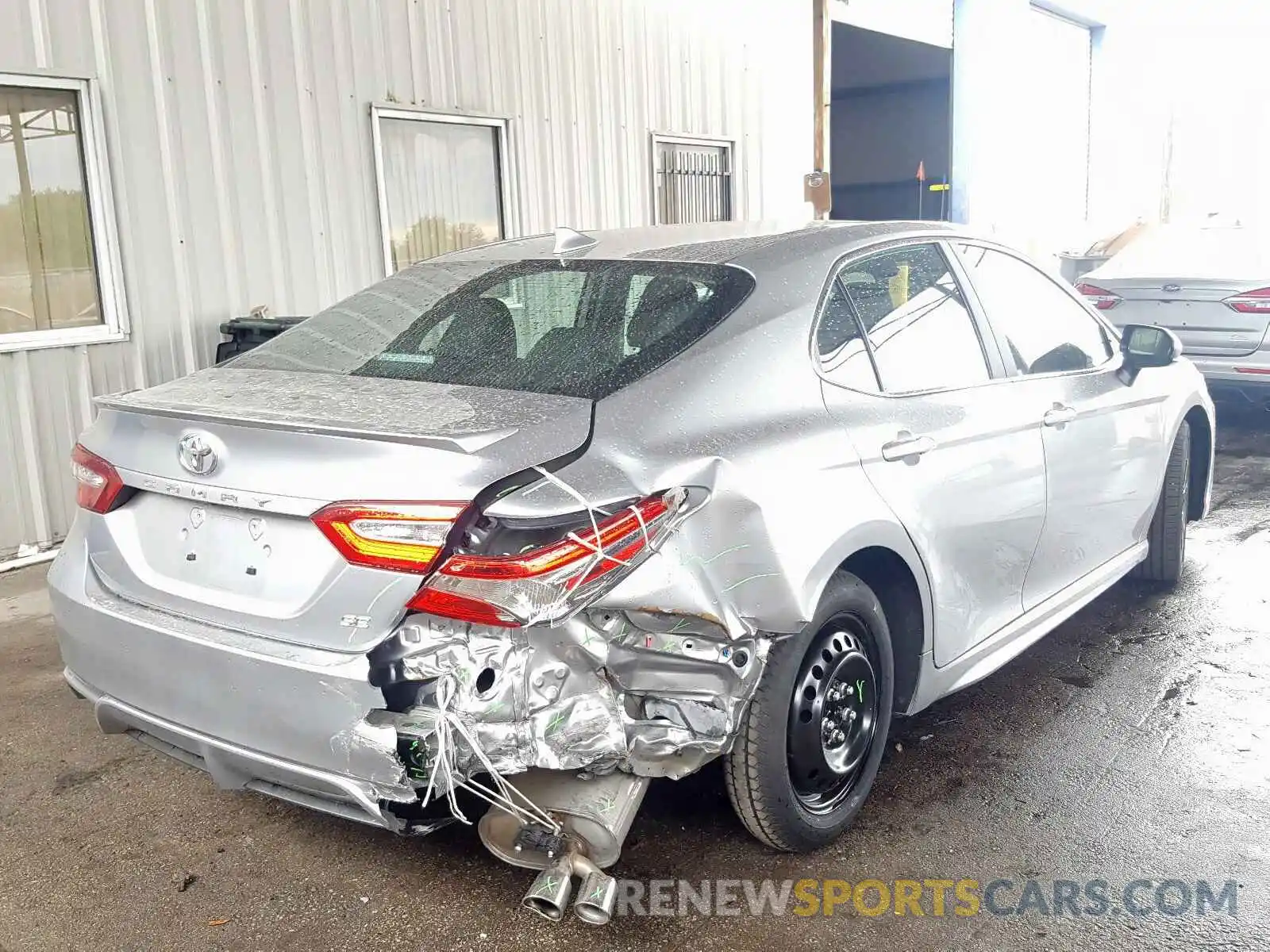 4 Photograph of a damaged car 4T1B11HK1KU797352 TOYOTA CAMRY 2019