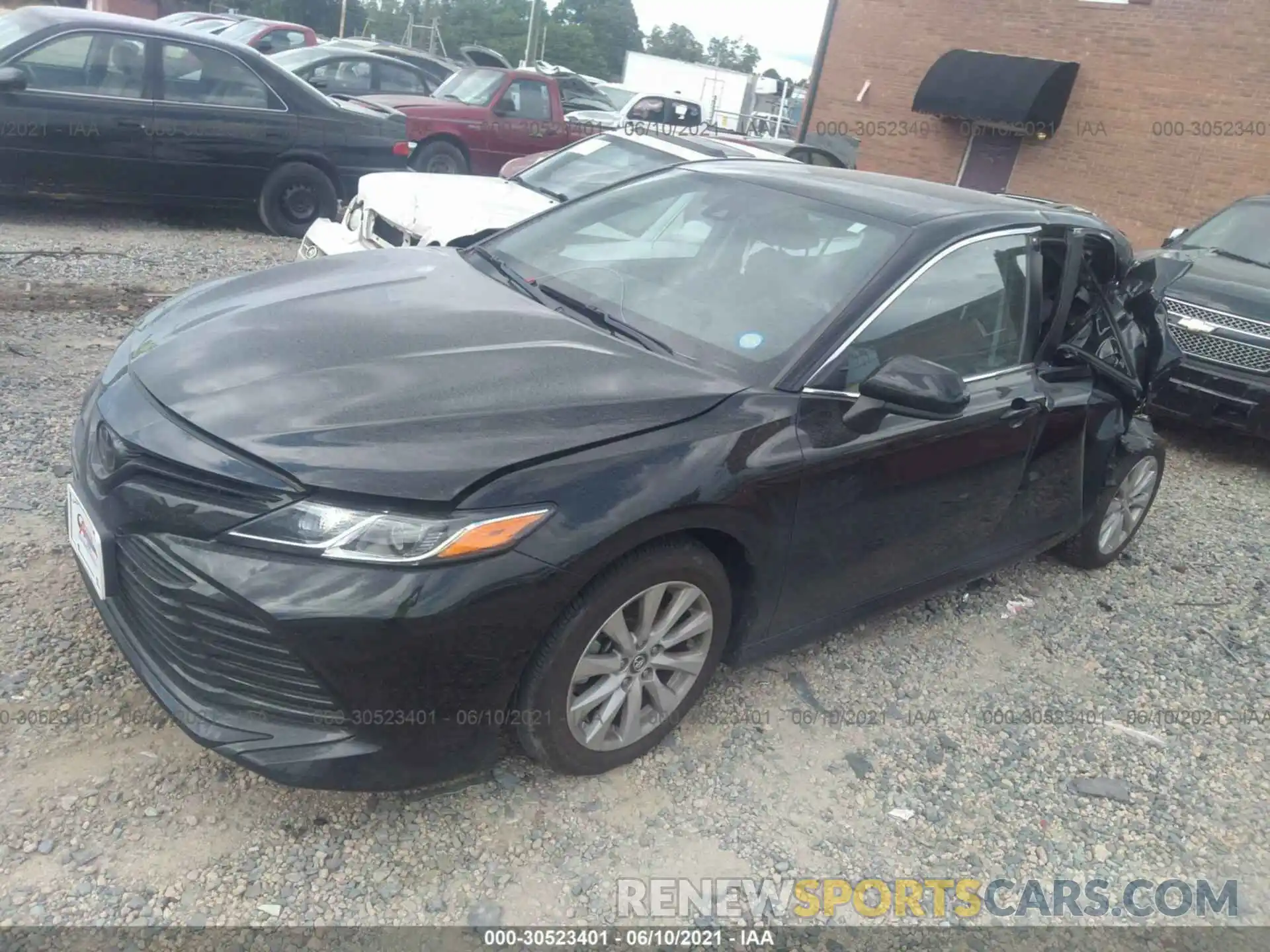 2 Photograph of a damaged car 4T1B11HK1KU798100 TOYOTA CAMRY 2019