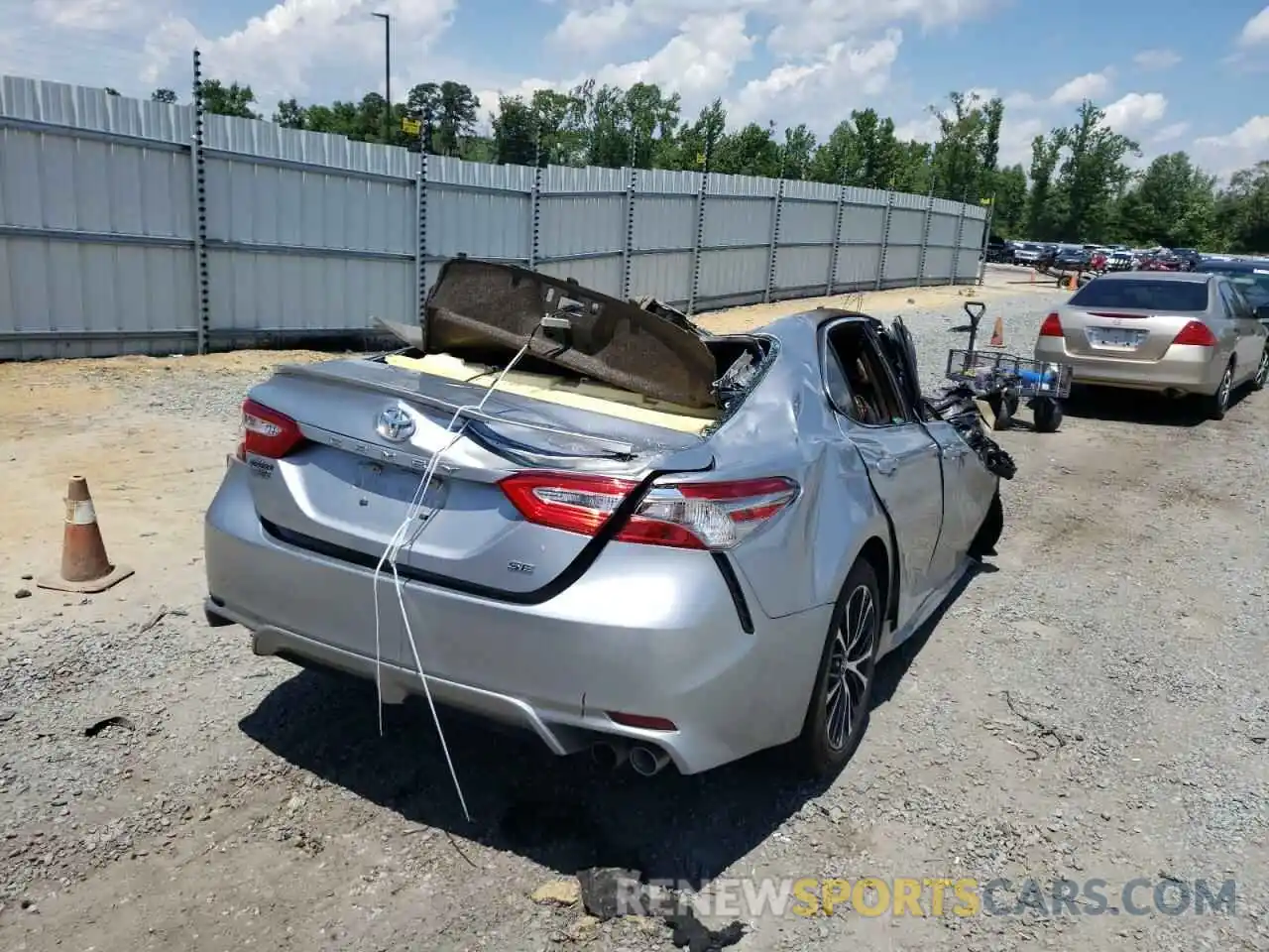 4 Photograph of a damaged car 4T1B11HK1KU798386 TOYOTA CAMRY 2019