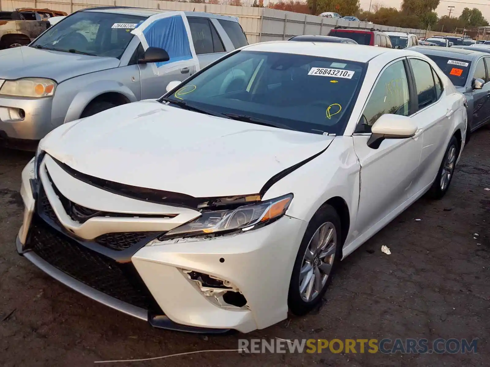 2 Photograph of a damaged car 4T1B11HK1KU802503 TOYOTA CAMRY 2019