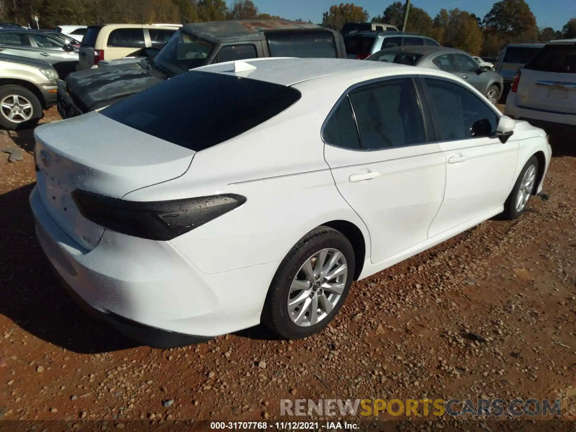 4 Photograph of a damaged car 4T1B11HK1KU803523 TOYOTA CAMRY 2019