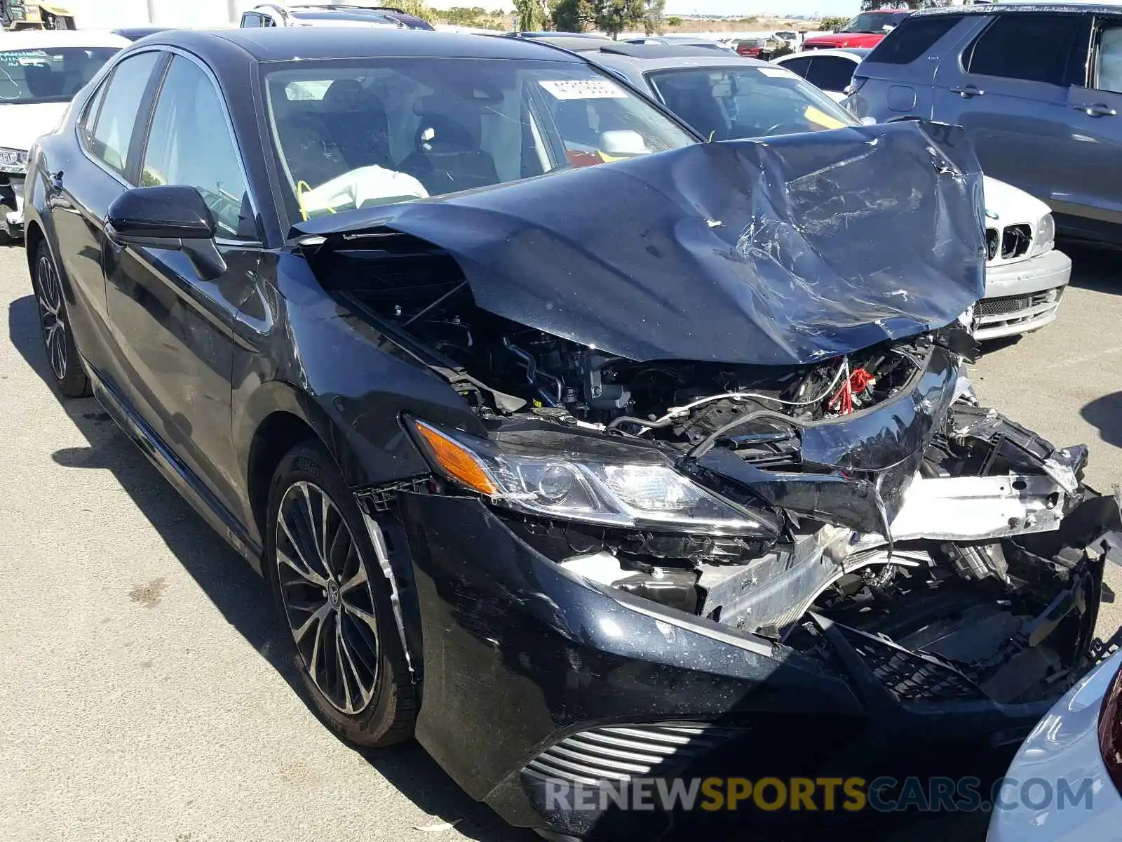 1 Photograph of a damaged car 4T1B11HK1KU803599 TOYOTA CAMRY 2019