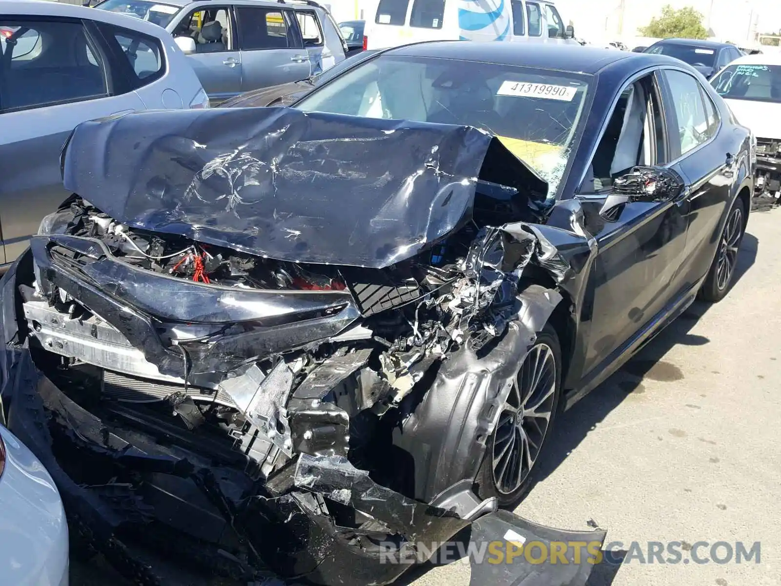 2 Photograph of a damaged car 4T1B11HK1KU803599 TOYOTA CAMRY 2019