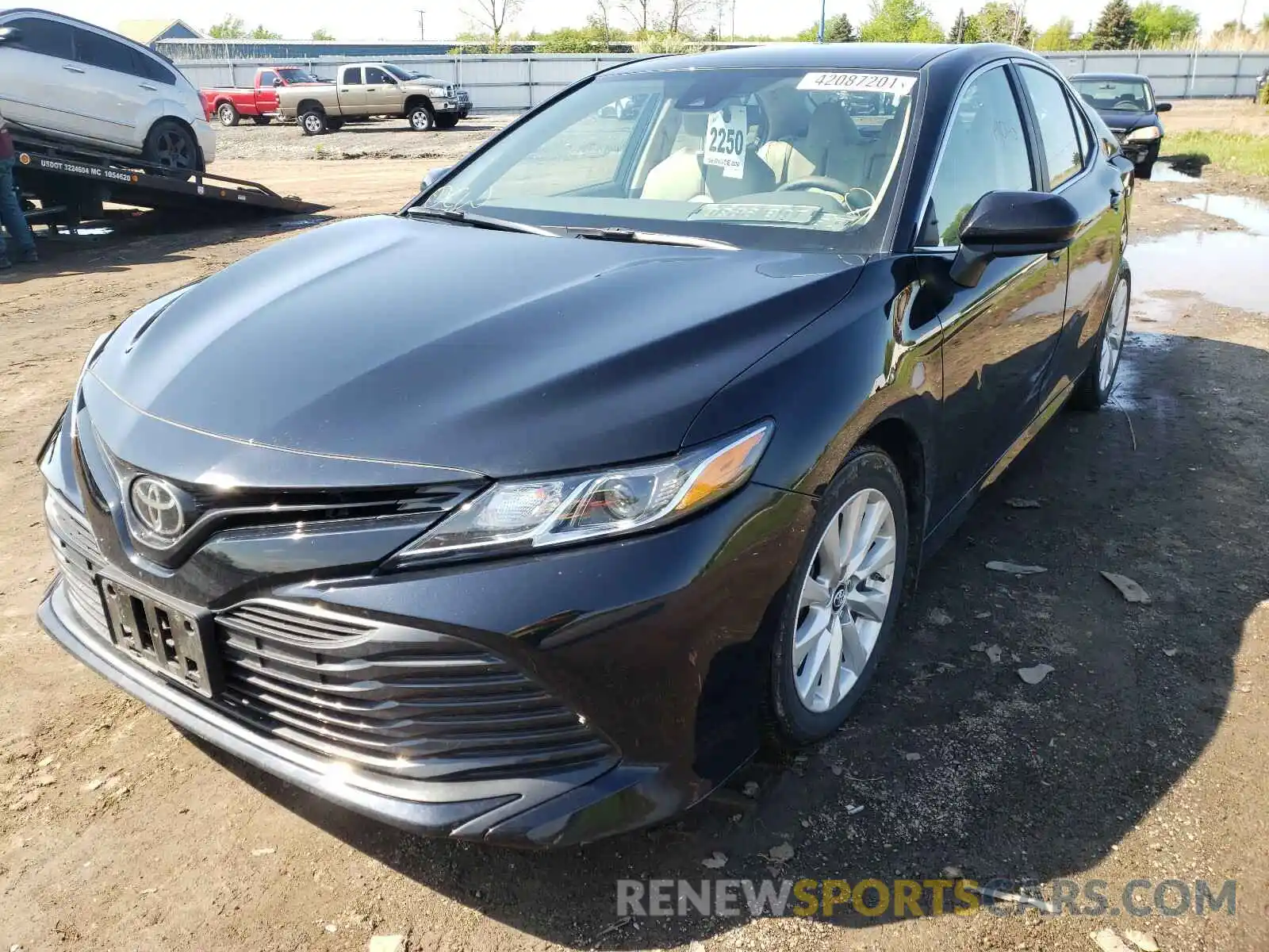 2 Photograph of a damaged car 4T1B11HK1KU803988 TOYOTA CAMRY 2019