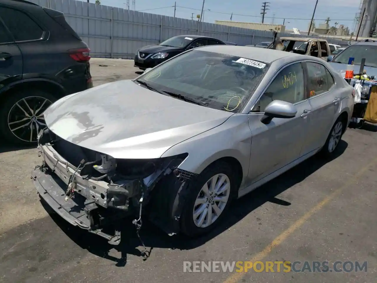 2 Photograph of a damaged car 4T1B11HK1KU804980 TOYOTA CAMRY 2019