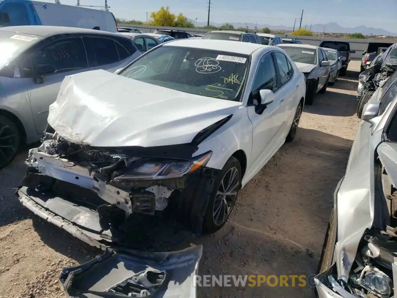 2 Photograph of a damaged car 4T1B11HK1KU808575 TOYOTA CAMRY 2019