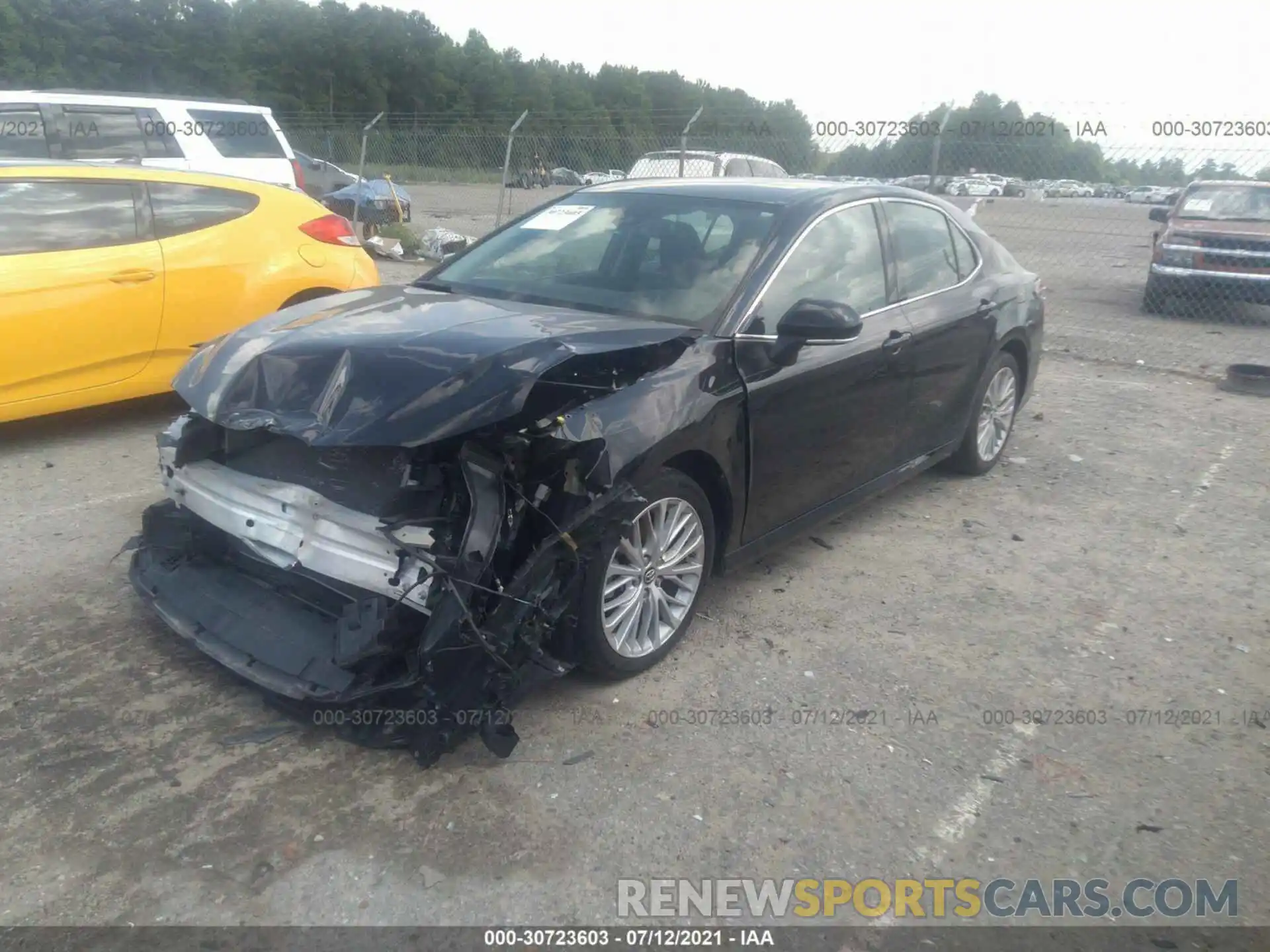 2 Photograph of a damaged car 4T1B11HK1KU809578 TOYOTA CAMRY 2019