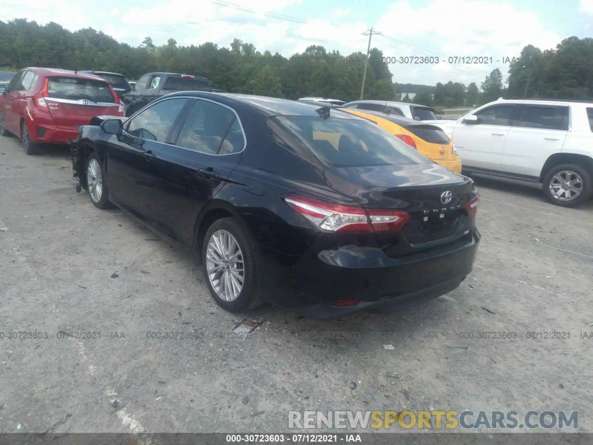 3 Photograph of a damaged car 4T1B11HK1KU809578 TOYOTA CAMRY 2019