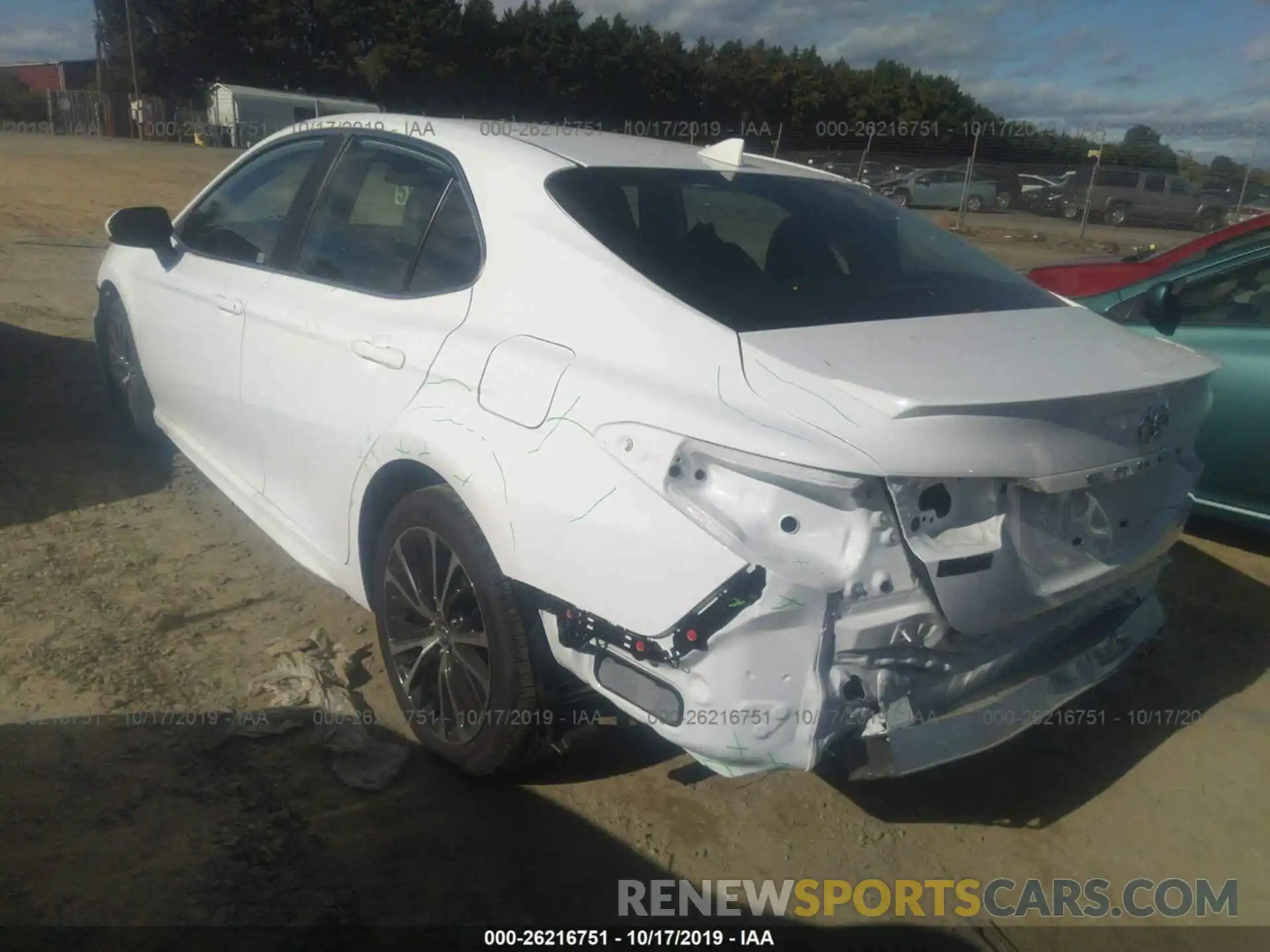 3 Photograph of a damaged car 4T1B11HK1KU810813 TOYOTA CAMRY 2019