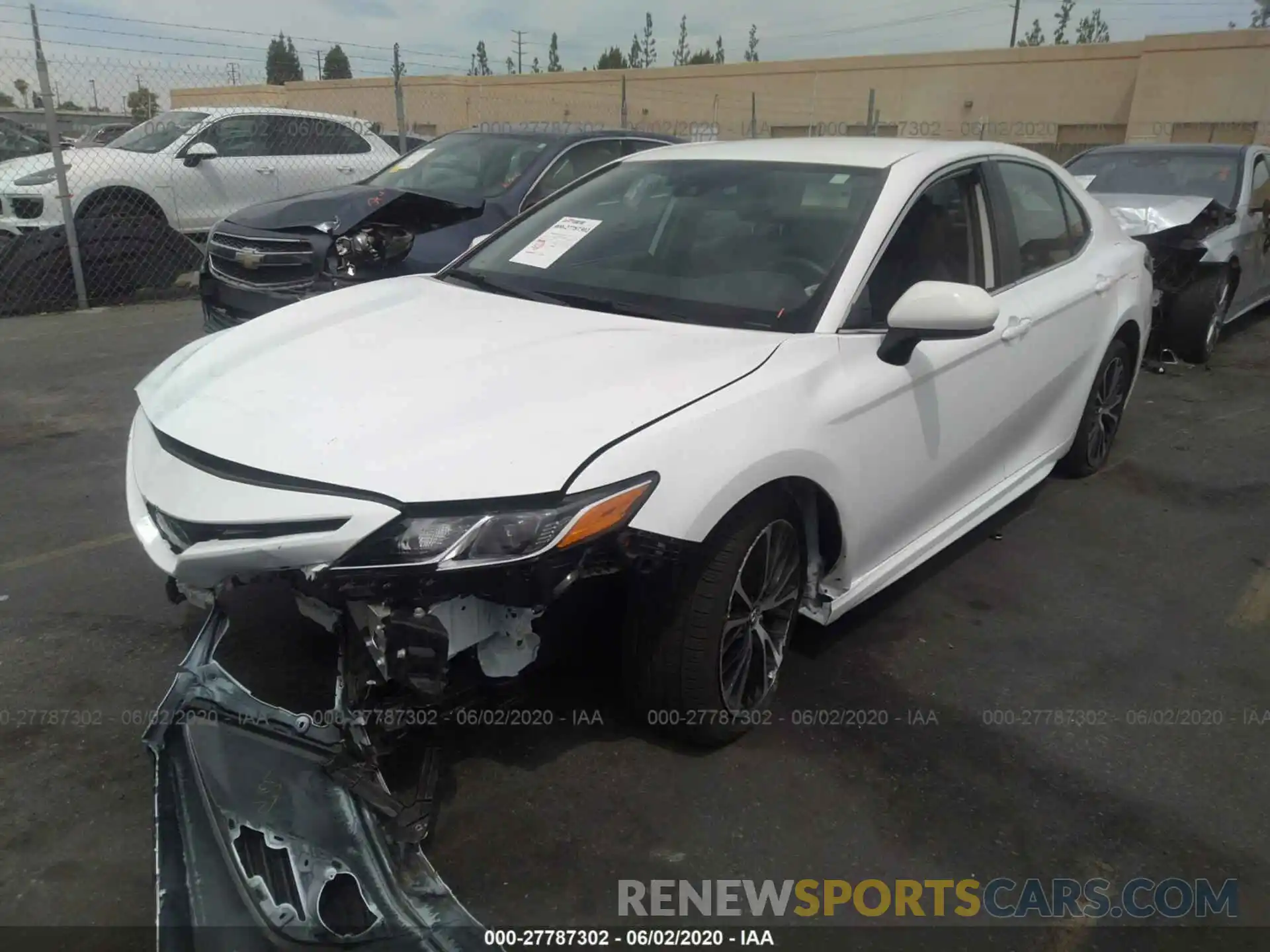 2 Photograph of a damaged car 4T1B11HK1KU812478 TOYOTA CAMRY 2019