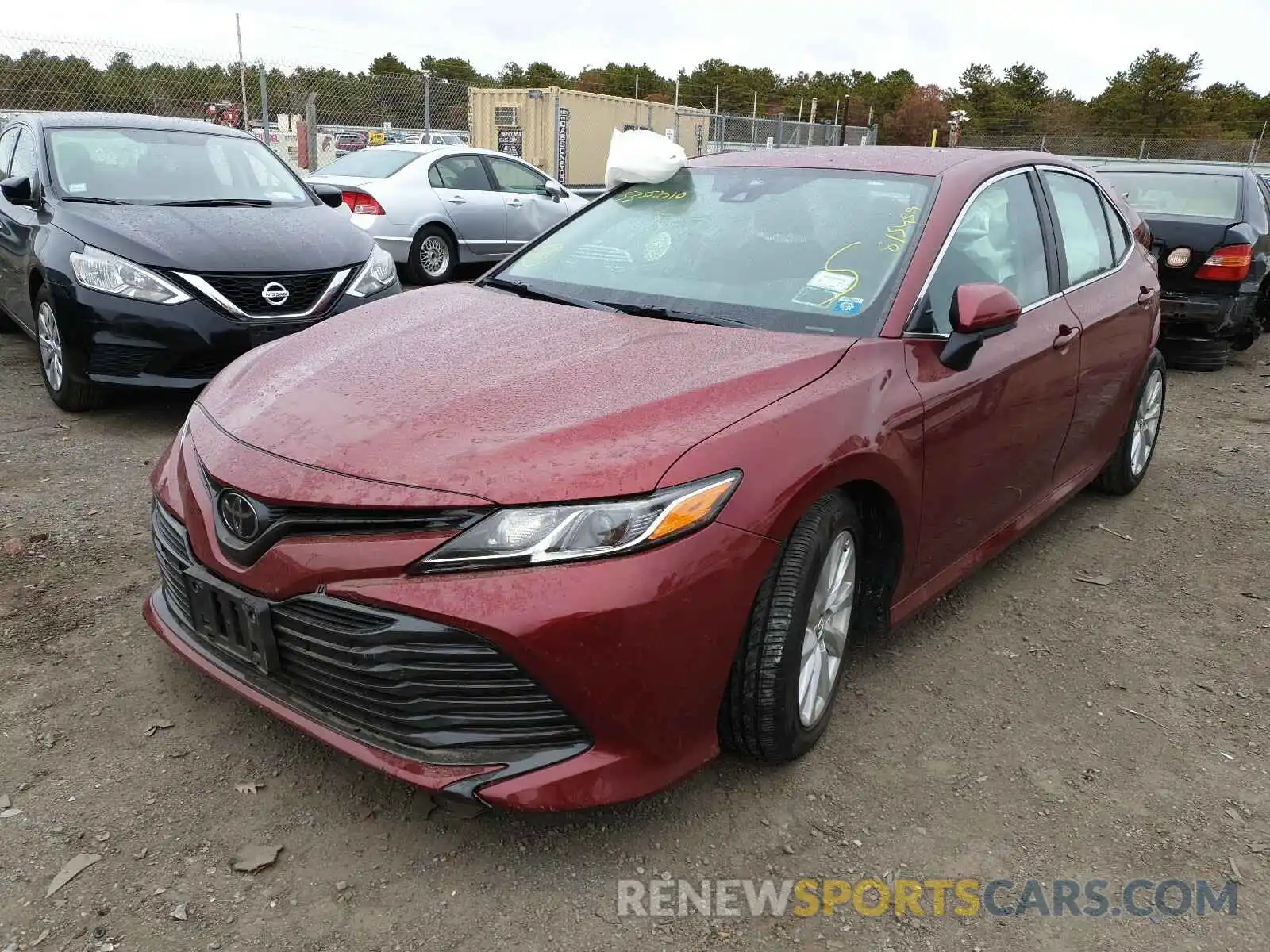 2 Photograph of a damaged car 4T1B11HK1KU815459 TOYOTA CAMRY 2019