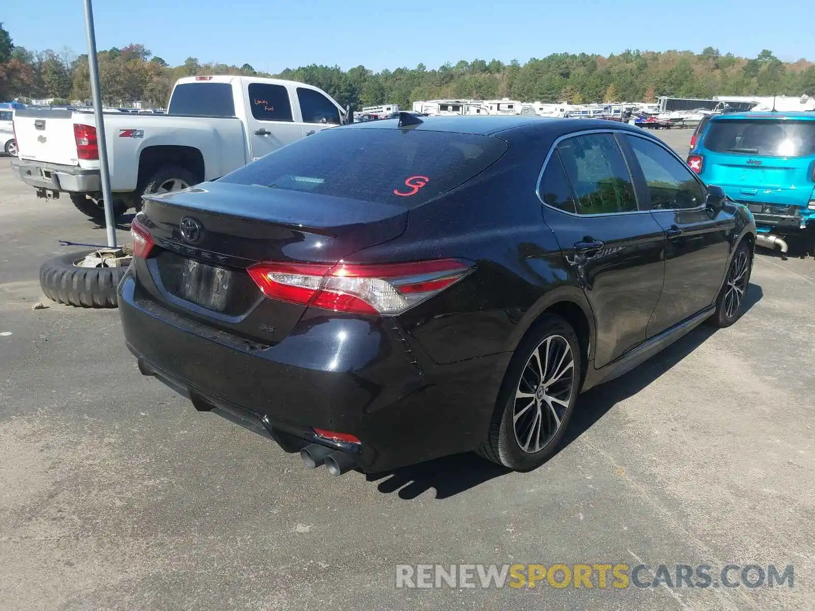 4 Photograph of a damaged car 4T1B11HK1KU819897 TOYOTA CAMRY 2019