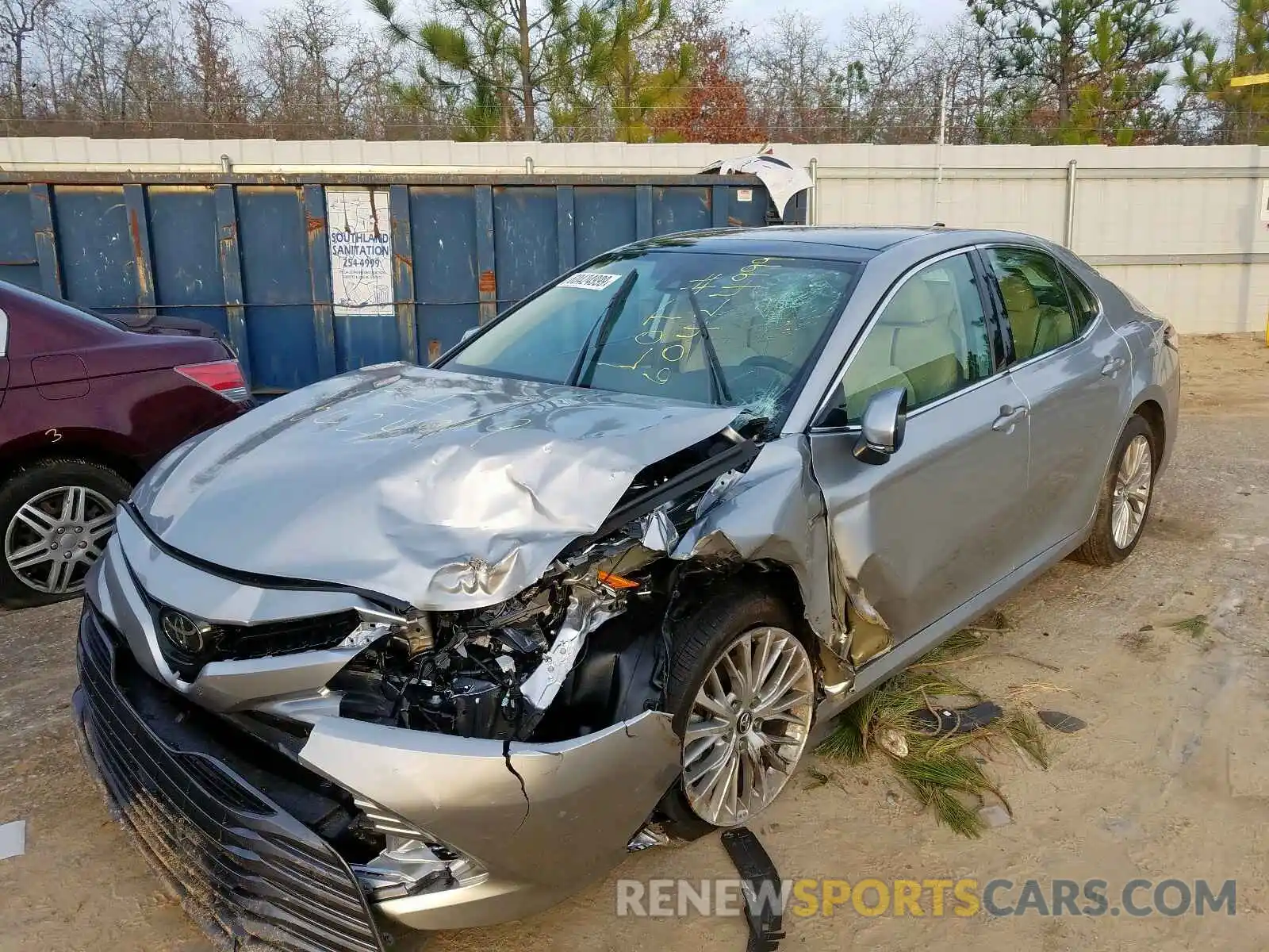 2 Photograph of a damaged car 4T1B11HK1KU823609 TOYOTA CAMRY 2019