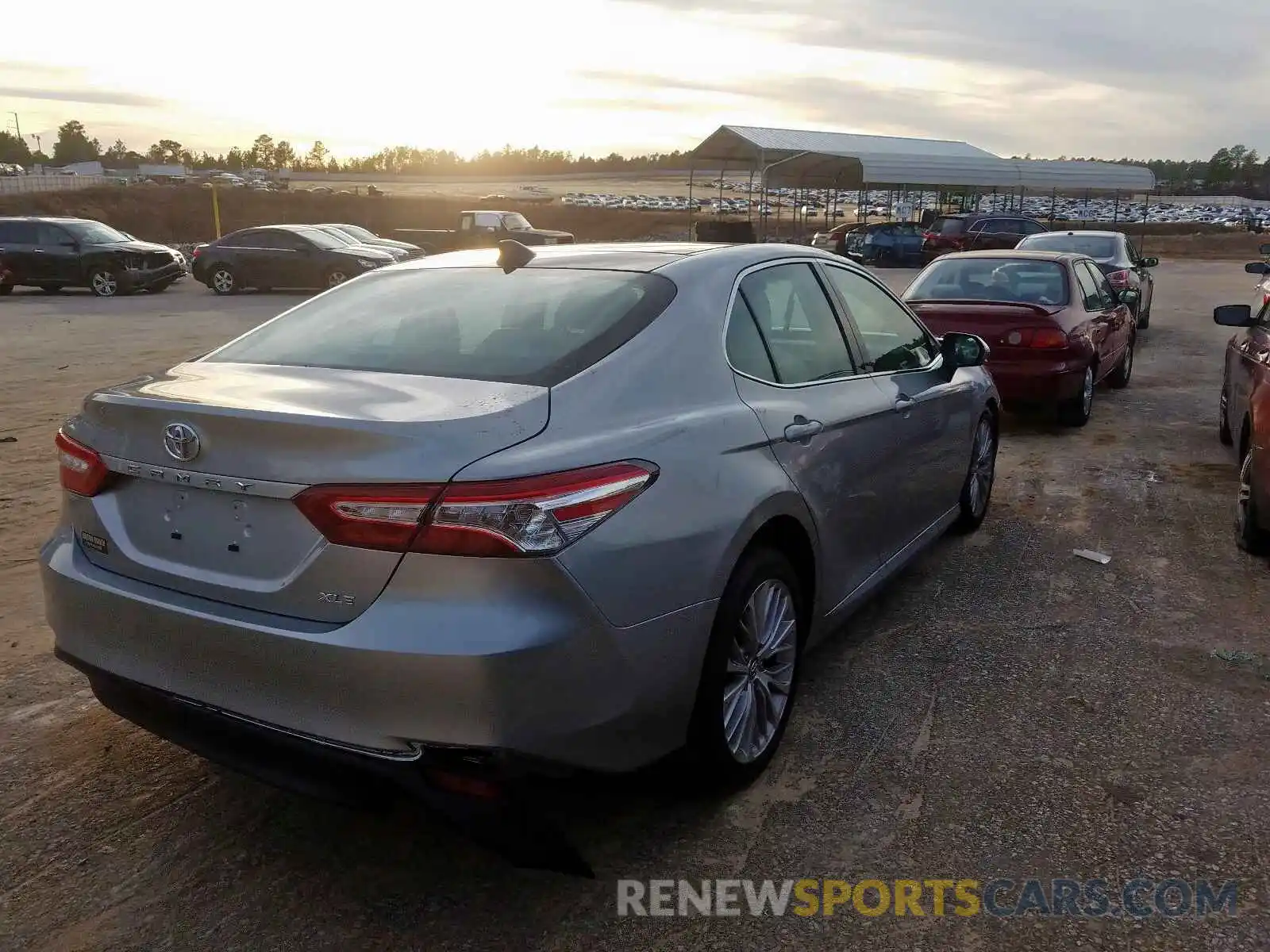 4 Photograph of a damaged car 4T1B11HK1KU823609 TOYOTA CAMRY 2019