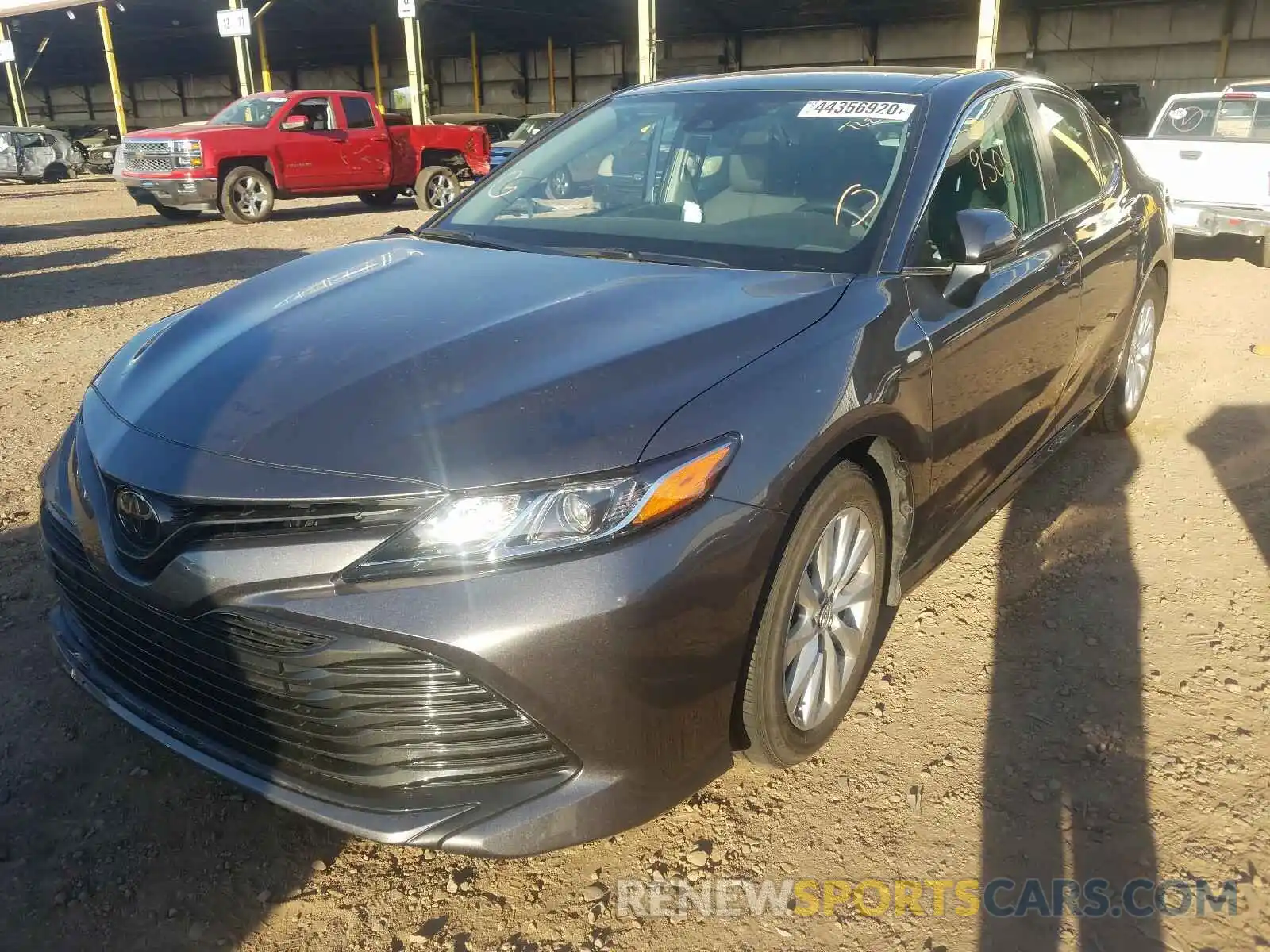 2 Photograph of a damaged car 4T1B11HK1KU824338 TOYOTA CAMRY 2019