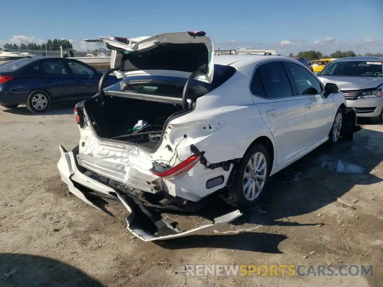 4 Photograph of a damaged car 4T1B11HK1KU827269 TOYOTA CAMRY 2019