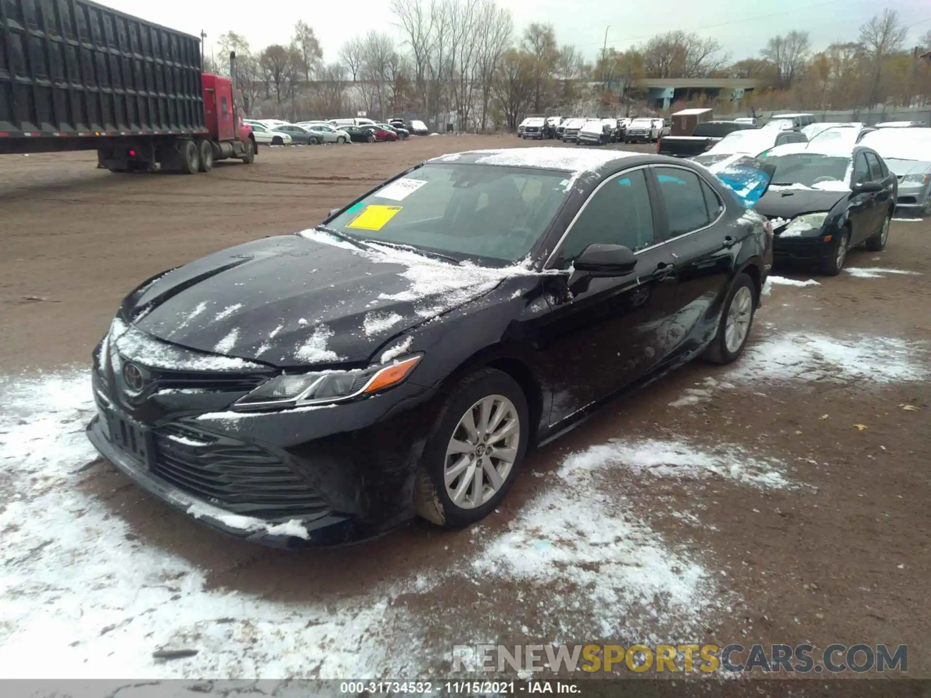 2 Photograph of a damaged car 4T1B11HK1KU827921 TOYOTA CAMRY 2019