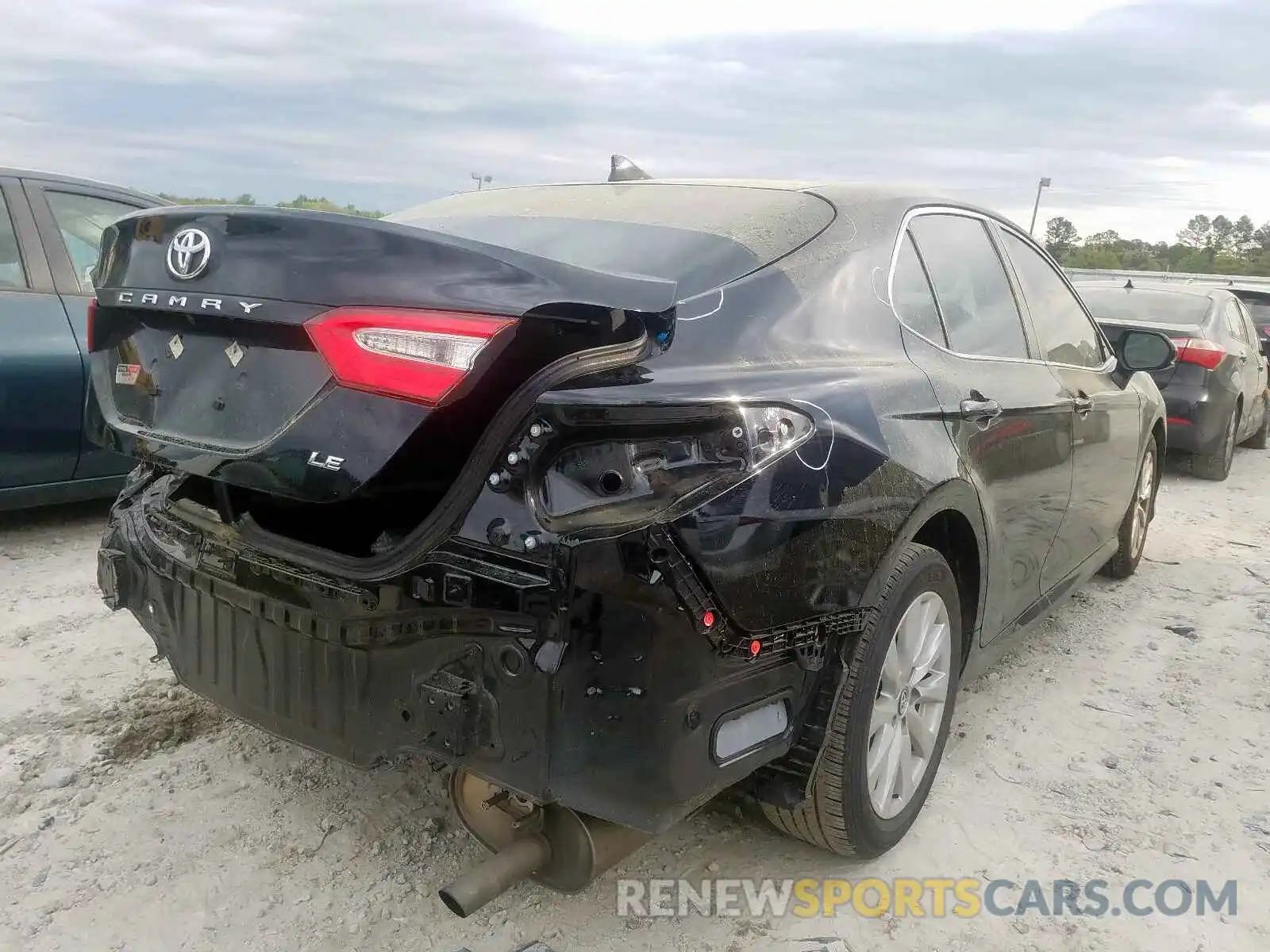 4 Photograph of a damaged car 4T1B11HK1KU846811 TOYOTA CAMRY 2019