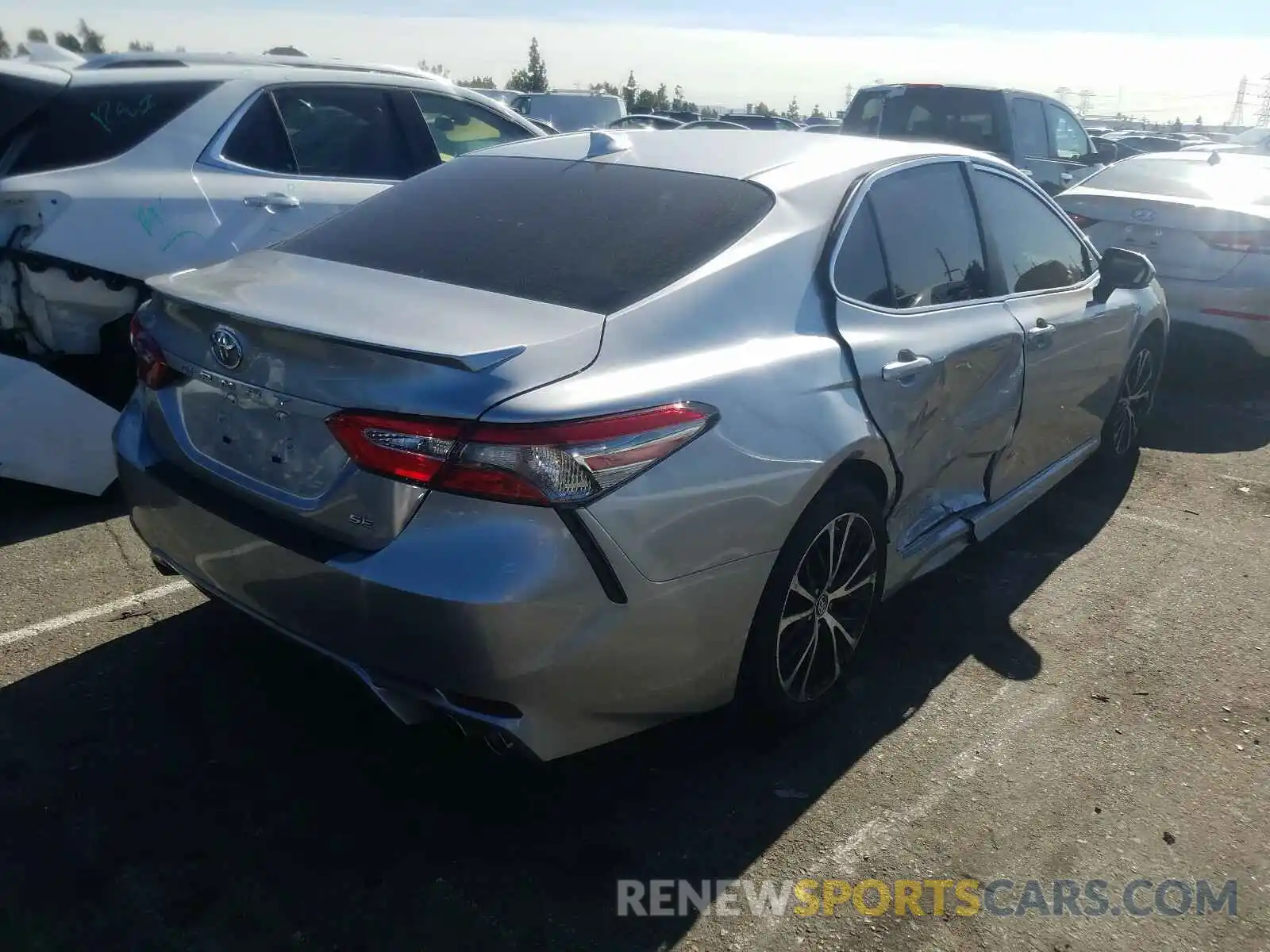 4 Photograph of a damaged car 4T1B11HK1KU847473 TOYOTA CAMRY 2019