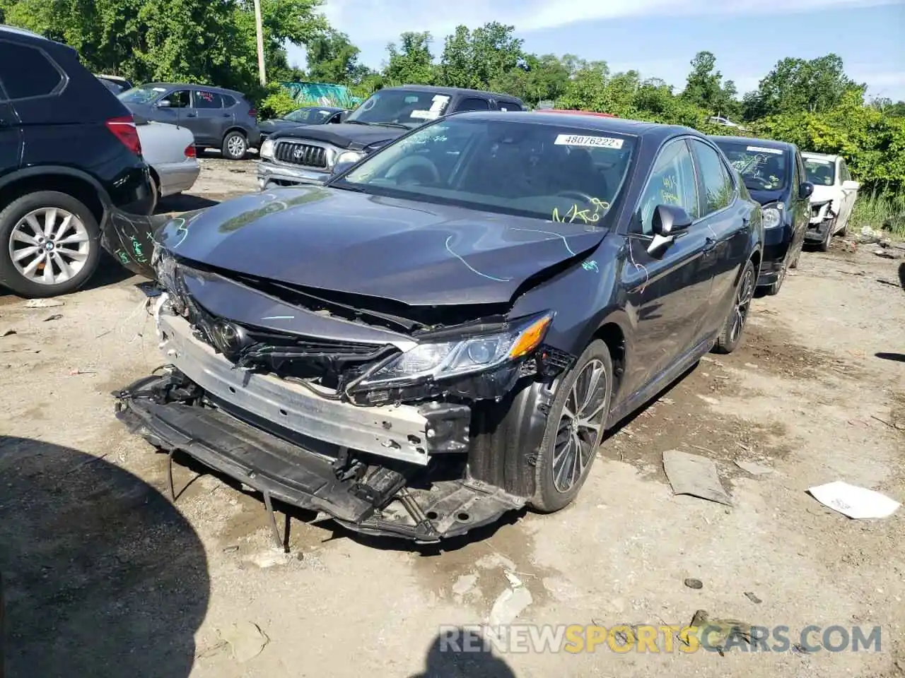 2 Photograph of a damaged car 4T1B11HK1KU848459 TOYOTA CAMRY 2019