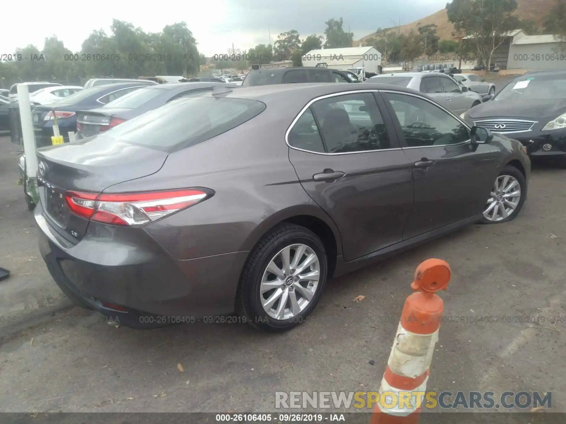 4 Photograph of a damaged car 4T1B11HK1KU849773 TOYOTA CAMRY 2019