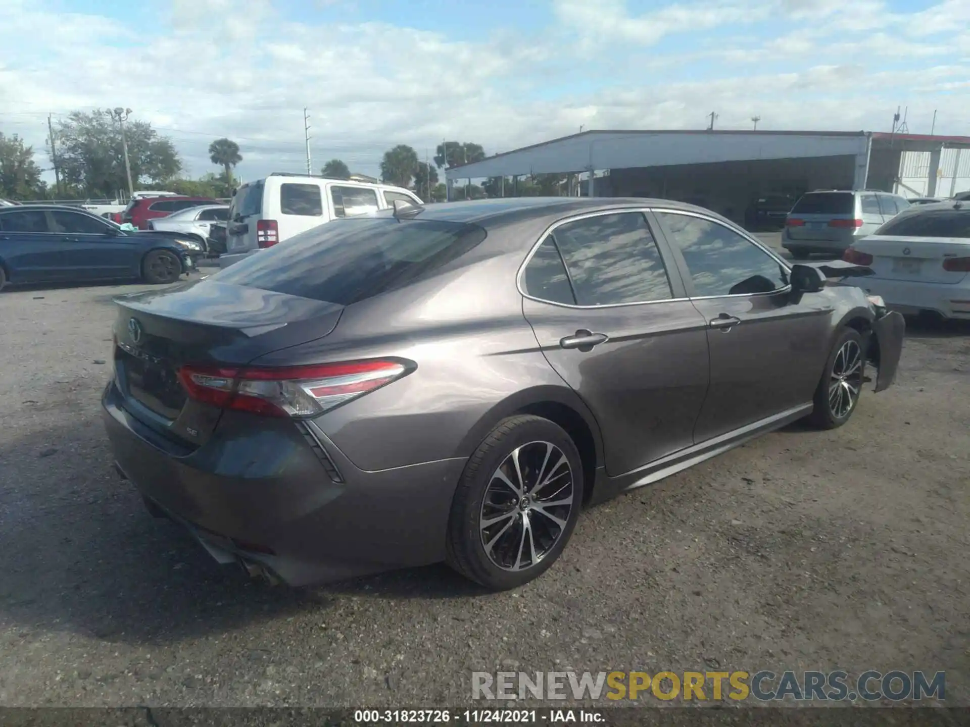 4 Photograph of a damaged car 4T1B11HK1KU854360 TOYOTA CAMRY 2019