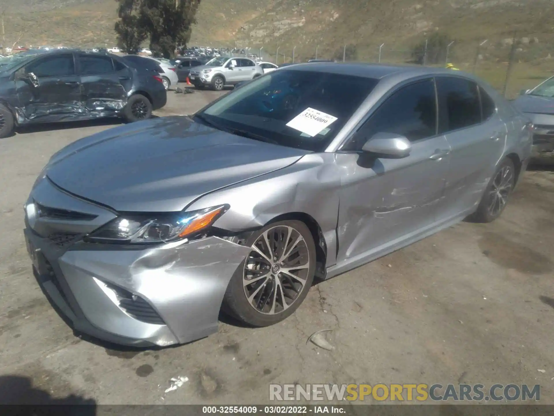 2 Photograph of a damaged car 4T1B11HK1KU855069 TOYOTA CAMRY 2019