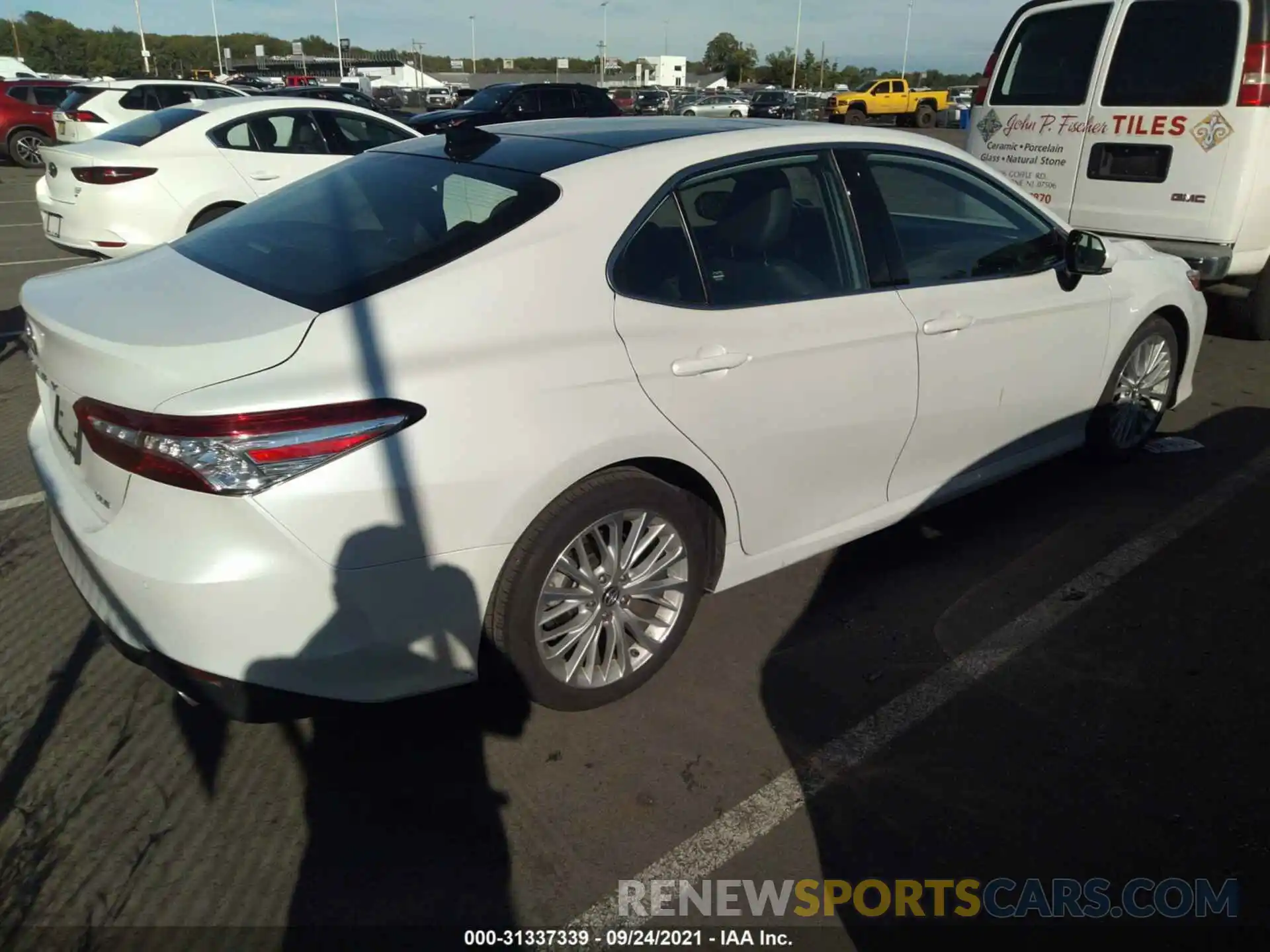 4 Photograph of a damaged car 4T1B11HK1KU855184 TOYOTA CAMRY 2019