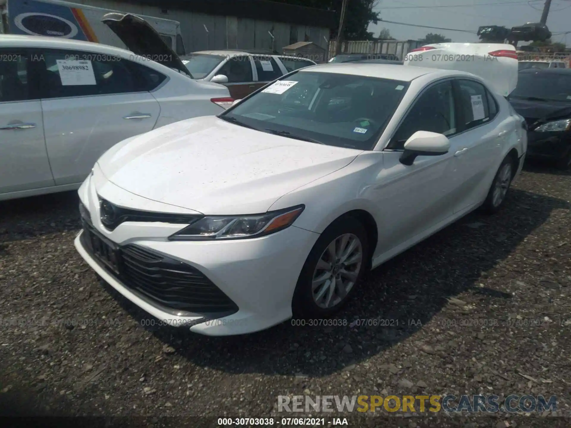 2 Photograph of a damaged car 4T1B11HK2KU161992 TOYOTA CAMRY 2019