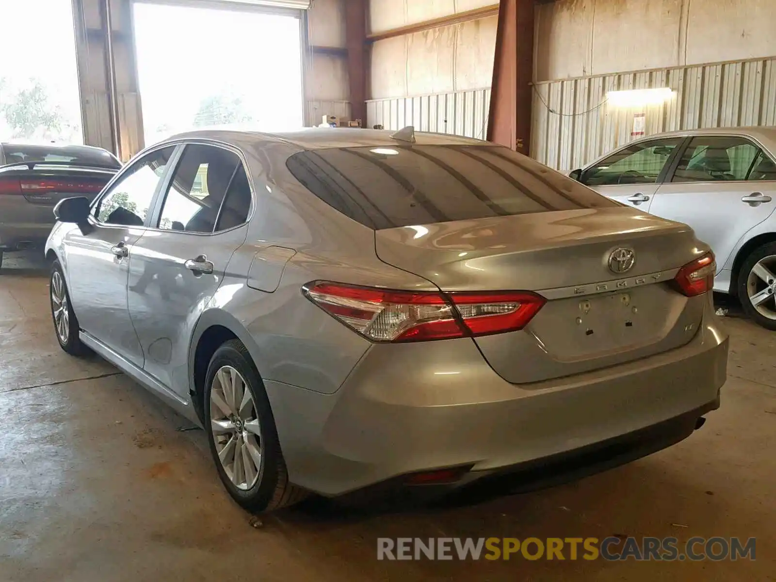 3 Photograph of a damaged car 4T1B11HK2KU164908 TOYOTA CAMRY 2019