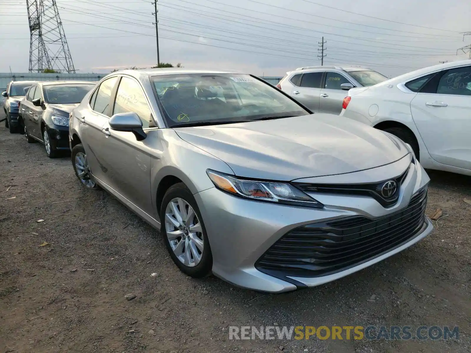 1 Photograph of a damaged car 4T1B11HK2KU166738 TOYOTA CAMRY 2019