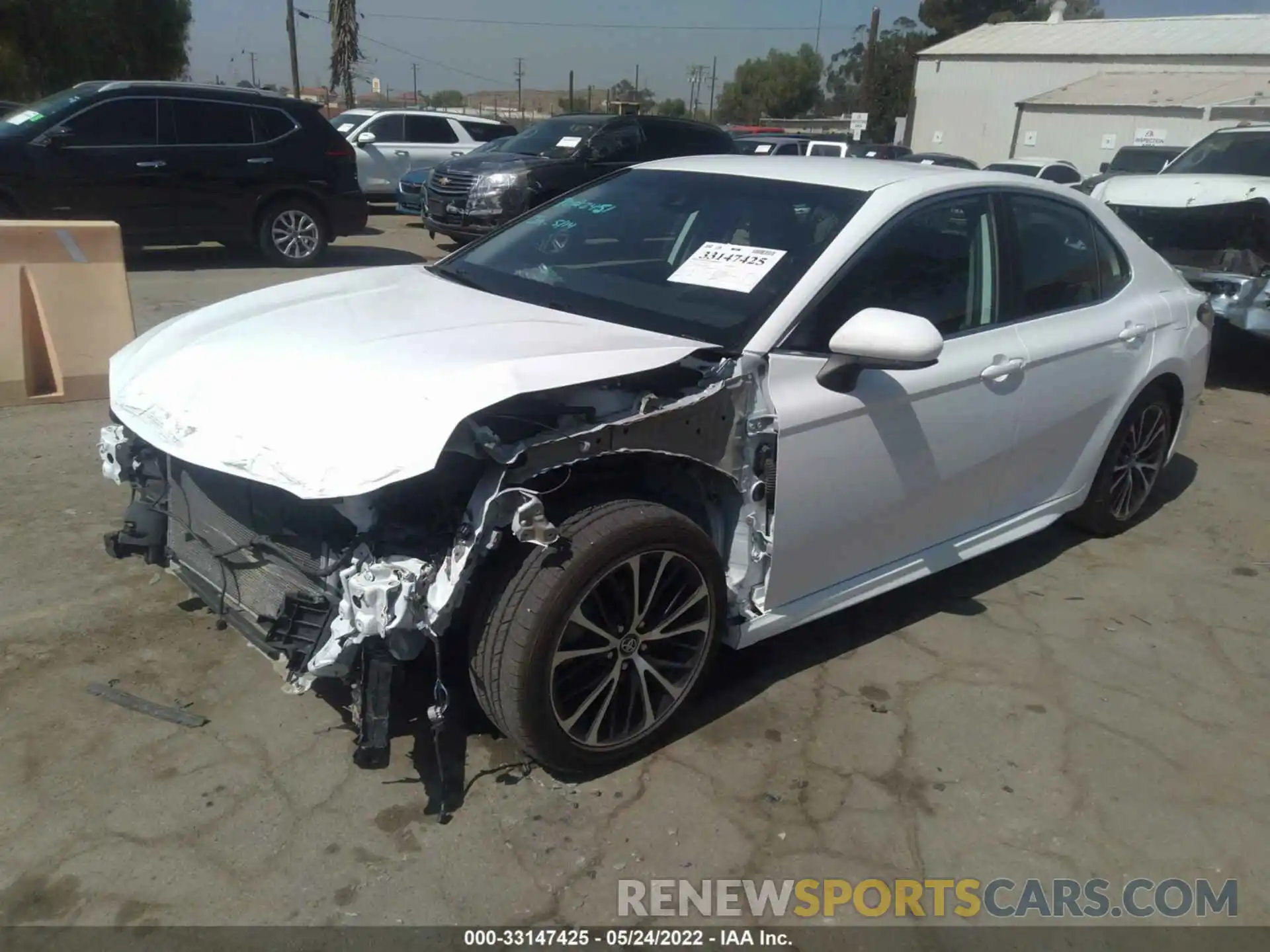 2 Photograph of a damaged car 4T1B11HK2KU169042 TOYOTA CAMRY 2019