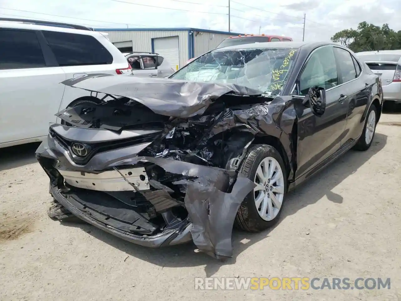 2 Photograph of a damaged car 4T1B11HK2KU169459 TOYOTA CAMRY 2019