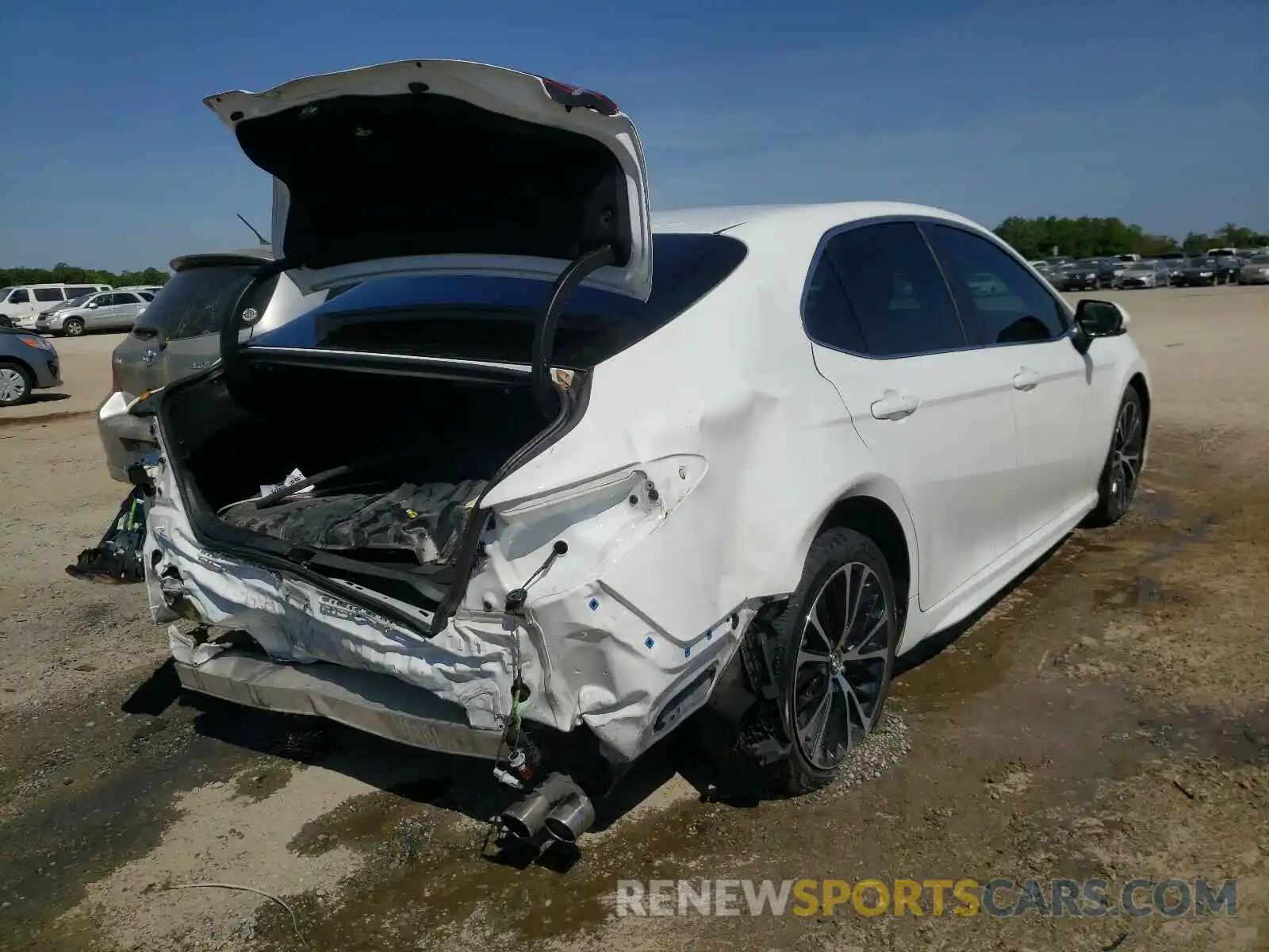 4 Photograph of a damaged car 4T1B11HK2KU169686 TOYOTA CAMRY 2019