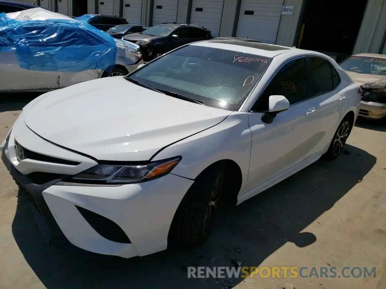 2 Photograph of a damaged car 4T1B11HK2KU171602 TOYOTA CAMRY 2019