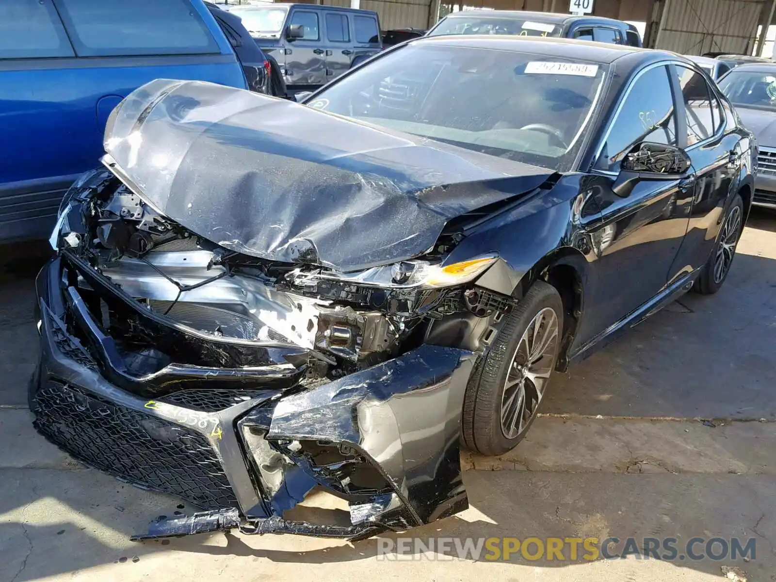 2 Photograph of a damaged car 4T1B11HK2KU173821 TOYOTA CAMRY 2019