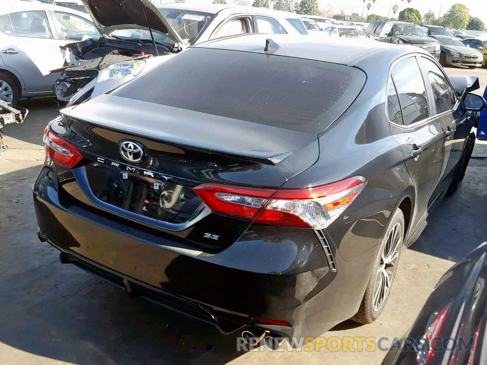 4 Photograph of a damaged car 4T1B11HK2KU173821 TOYOTA CAMRY 2019