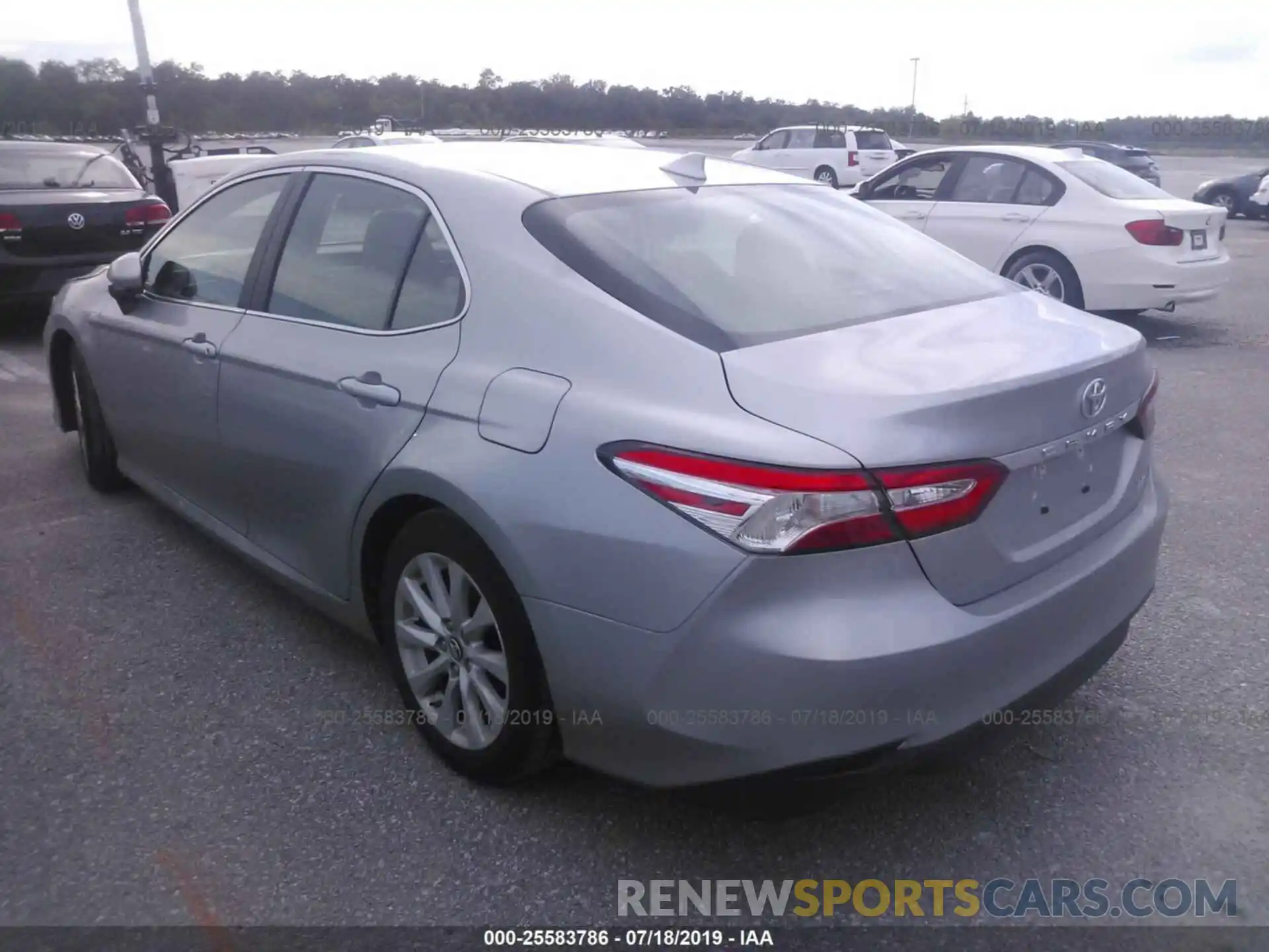 3 Photograph of a damaged car 4T1B11HK2KU182695 TOYOTA CAMRY 2019