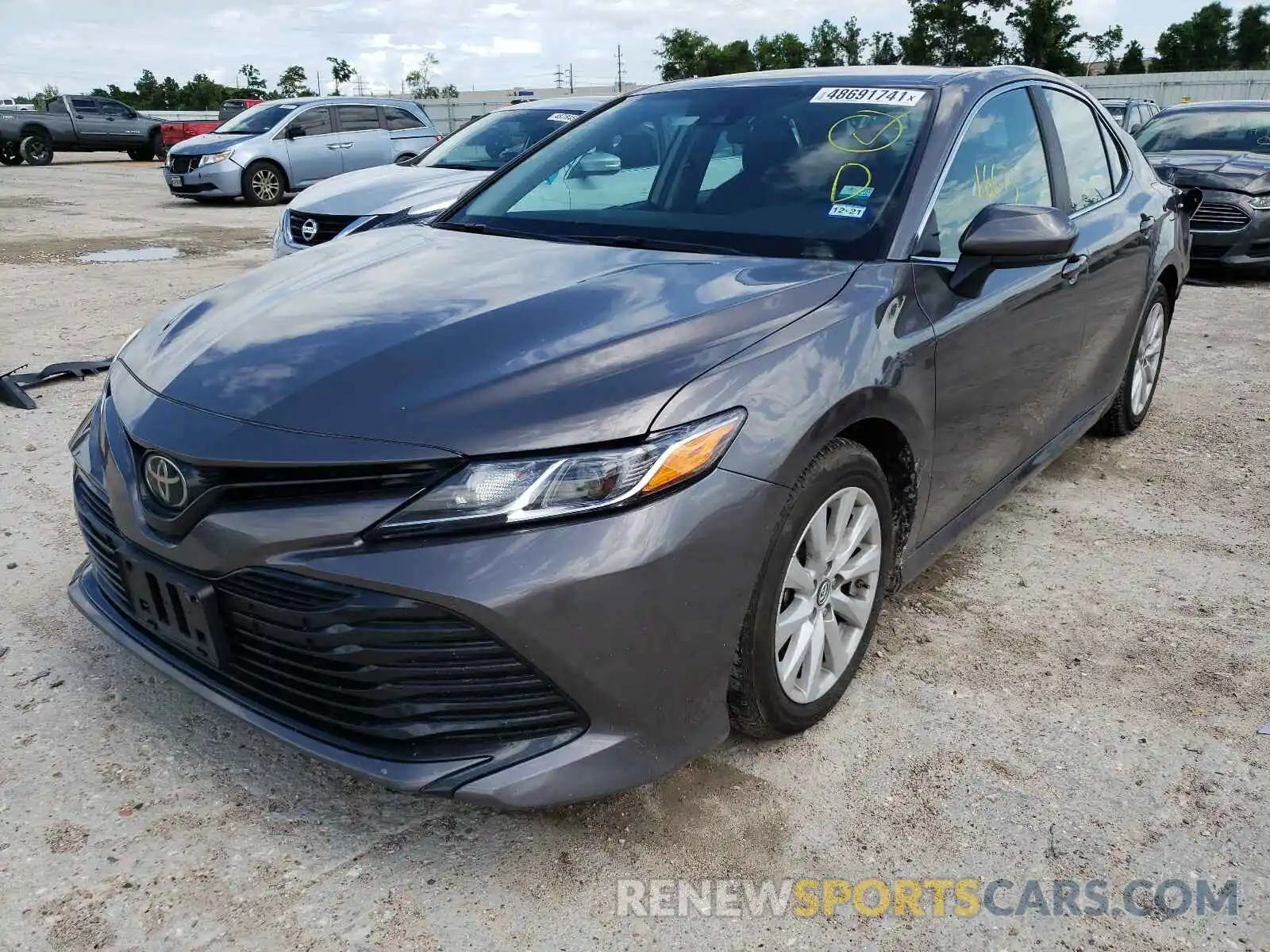 2 Photograph of a damaged car 4T1B11HK2KU194622 TOYOTA CAMRY 2019