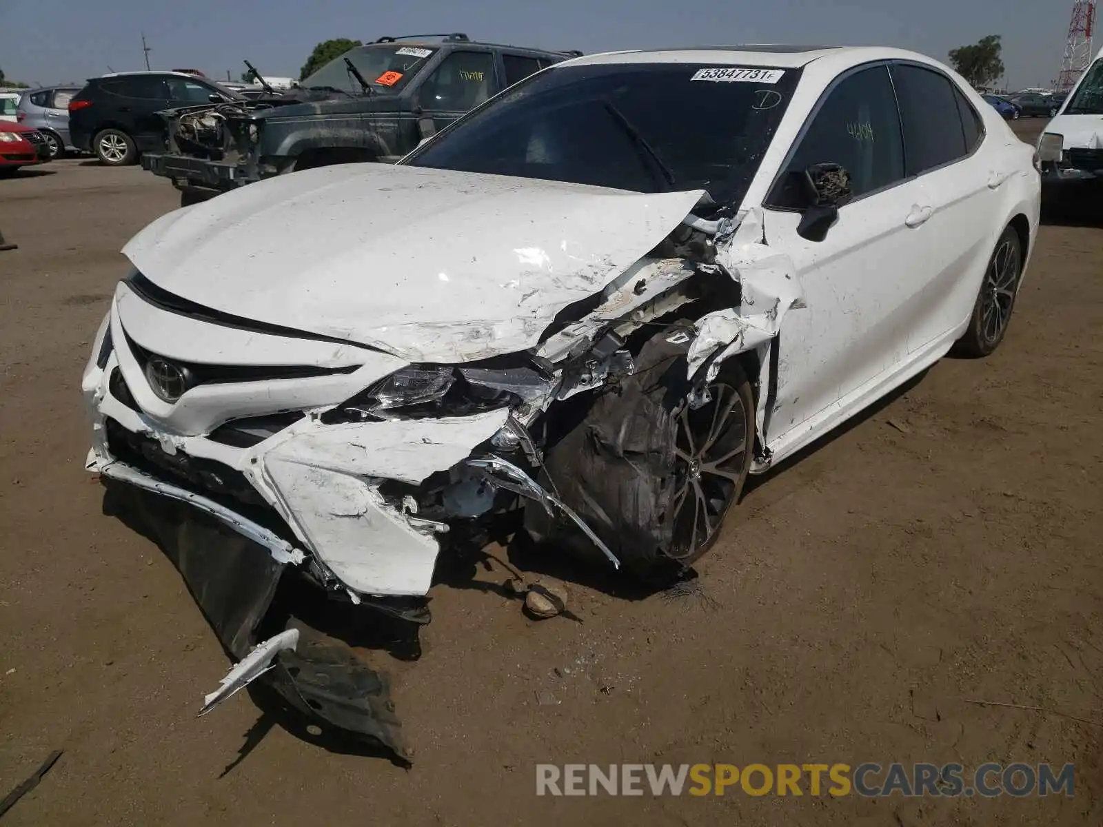 2 Photograph of a damaged car 4T1B11HK2KU194698 TOYOTA CAMRY 2019